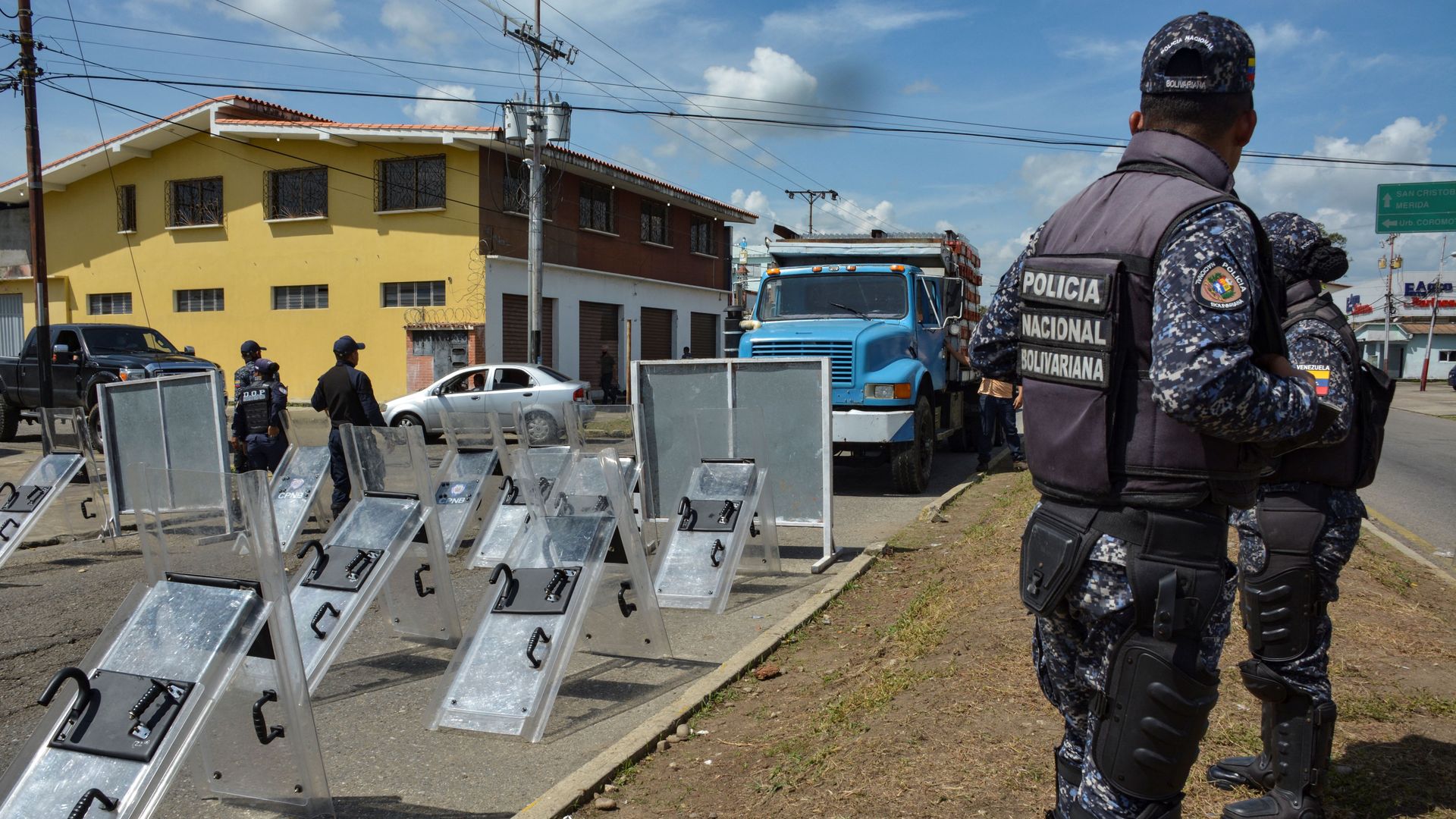  Bolivarian National Police stand outside of the electoral council of Barinas, in western Venezuela.