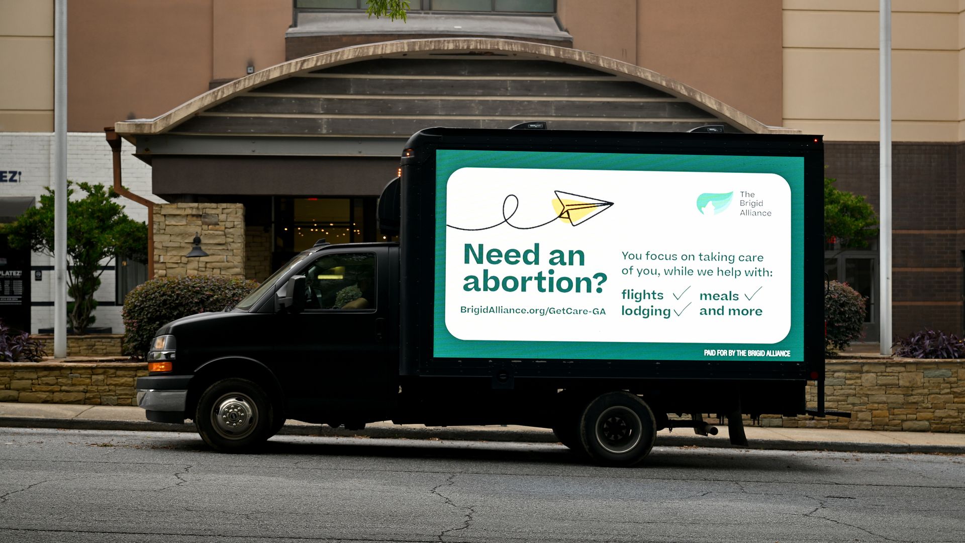 A mobile digital advertisement showcasing abortion services is seen outside a building in Atlanta, Georgia.