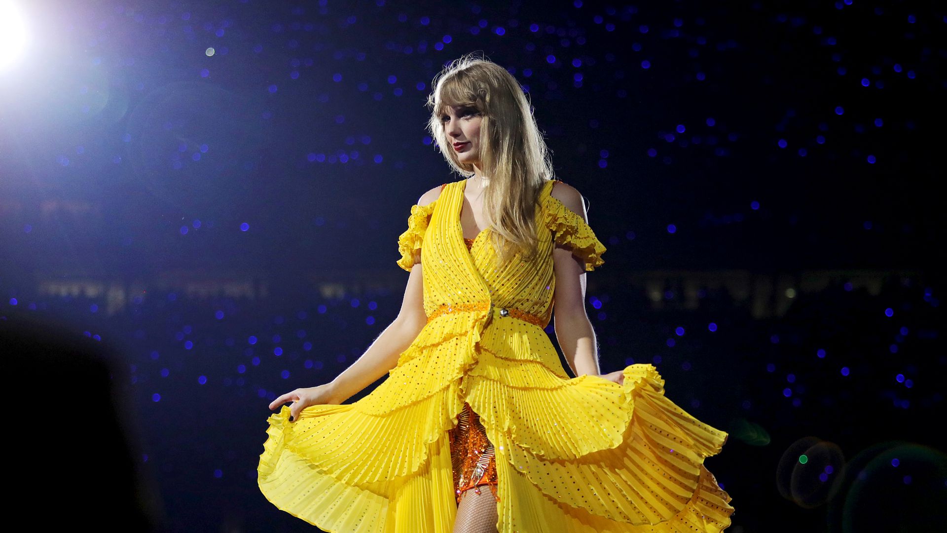 Photo of Taylor Swift in a yellow dress