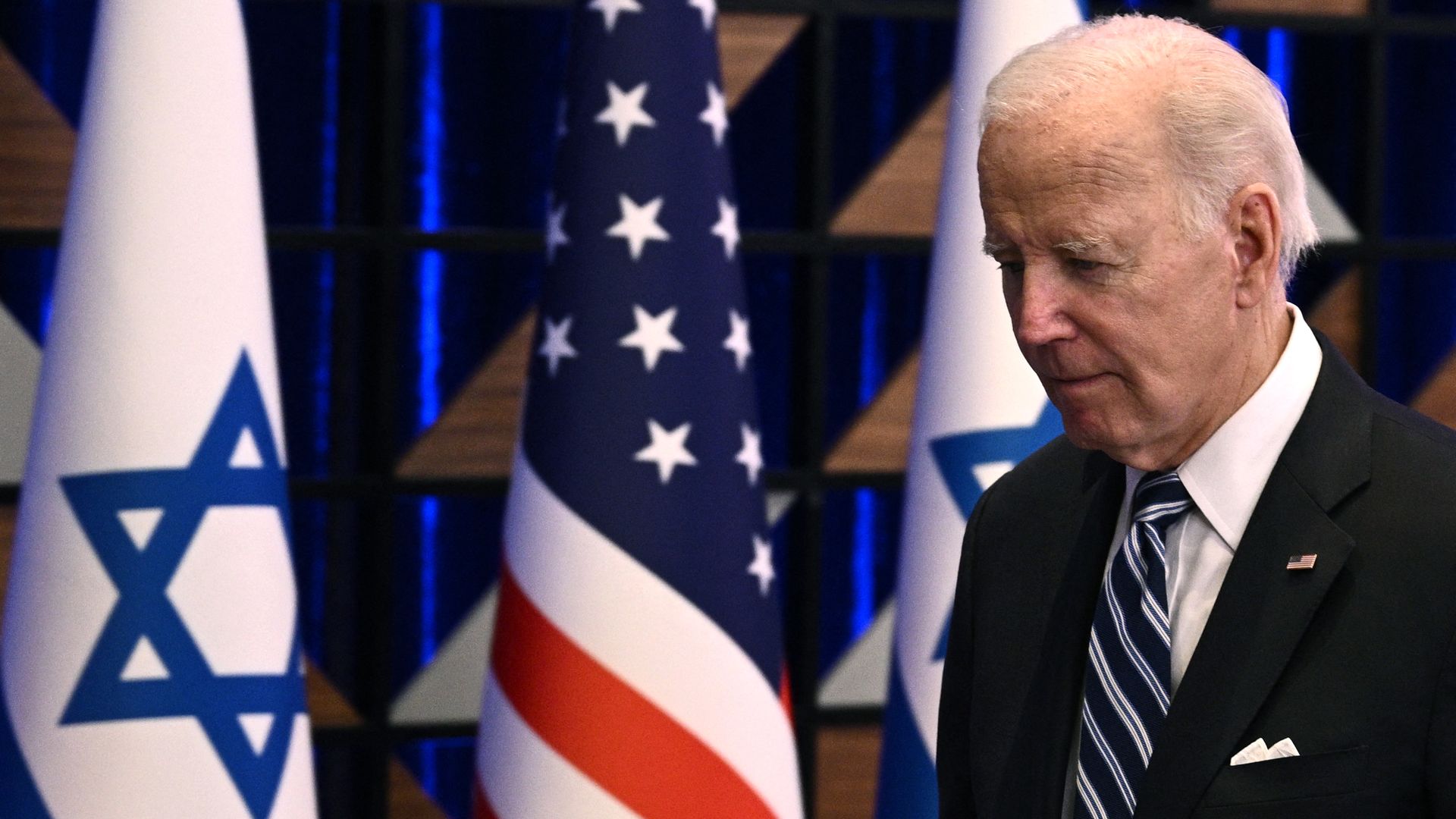 US President Joe Biden leaves the room at the end of a press conference following a solidarity visit to Israel, on October 18, 2023, in Tel Aviv,