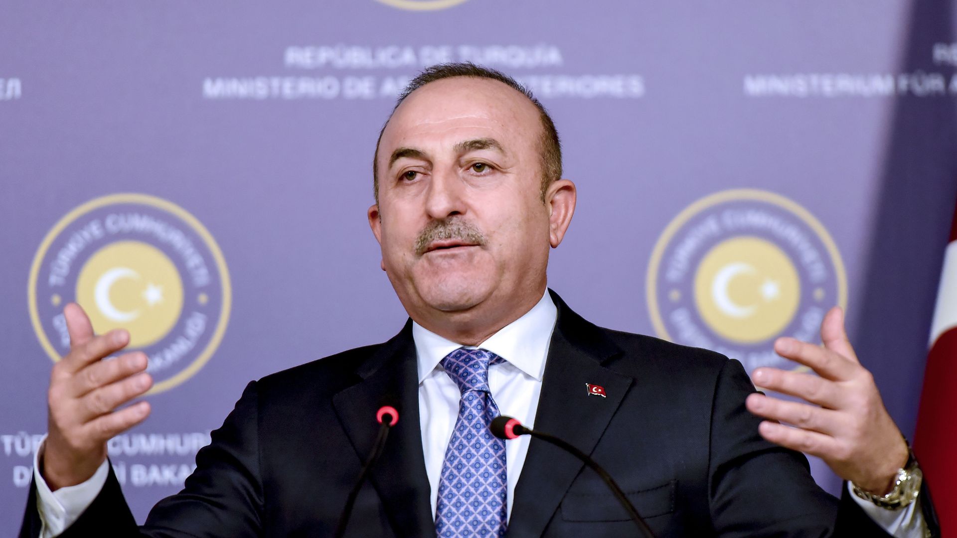 Turkish foreign minister Cavusoglu at a press conference