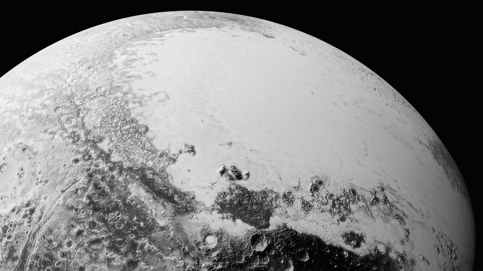 Pluto as seen in black and white by the New Horizons mission