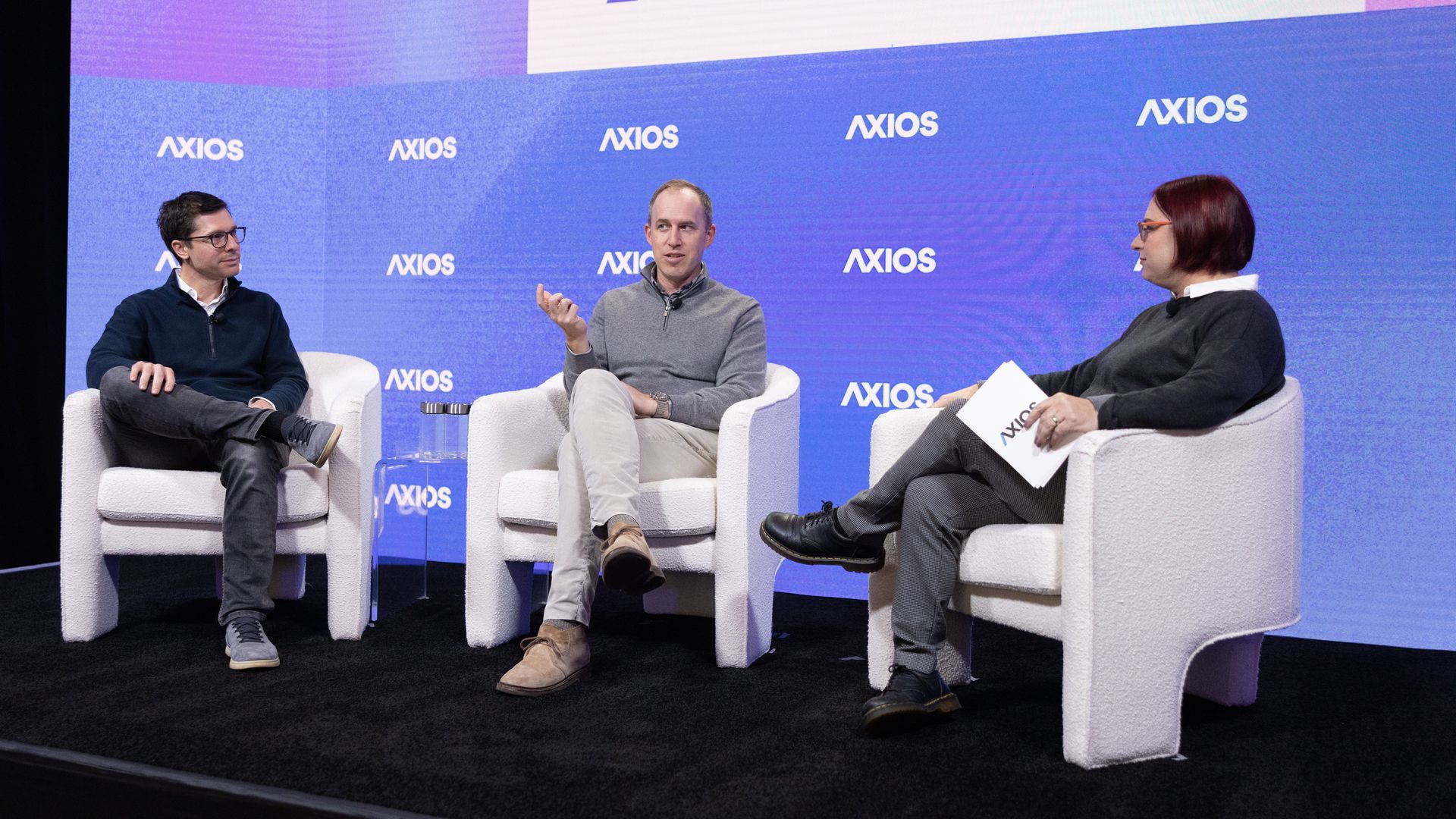 Clay Bavor and Bret Taylor speak to Ina Fried at Axios' AI+ Summit in San Francisco on Dec. 17. Photo credits: Chris Constantine on behalf of Axios