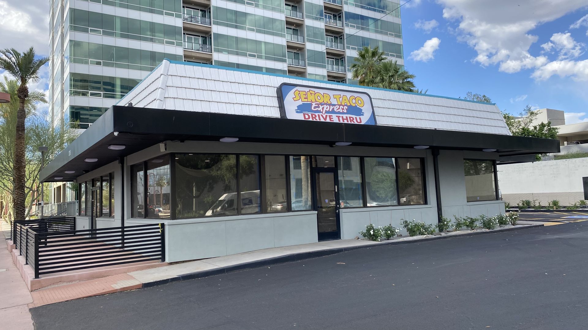 A fast food restaurant with a sign that says Señor Taco Express Drive Through.