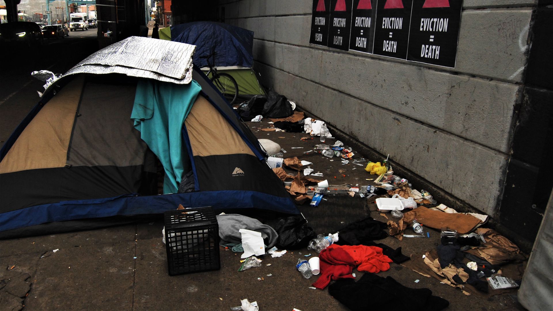 Tents and debris under a bridge in Philadelphia