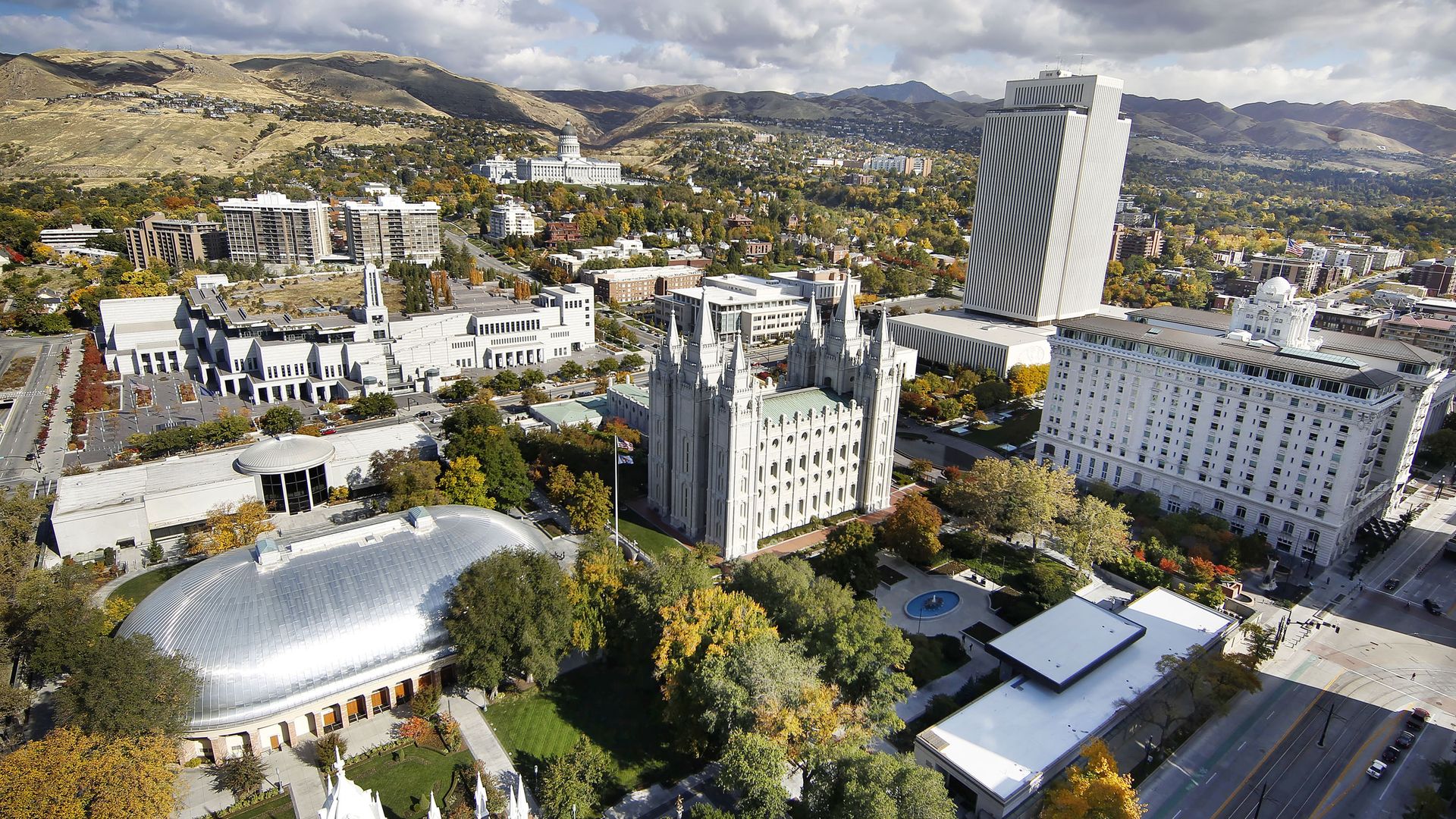 Skyline view of Salt Lake City, featuring the state Capitol and Church of Jesus Christ of Latter-day Saints temple.