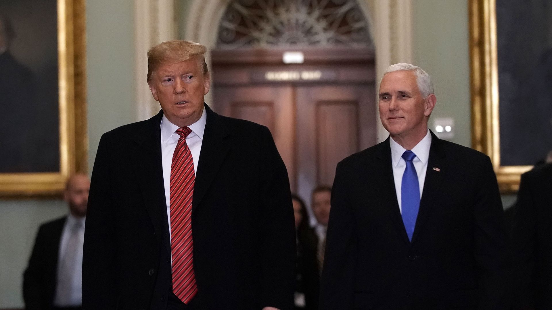 Pence and trump walking together. 