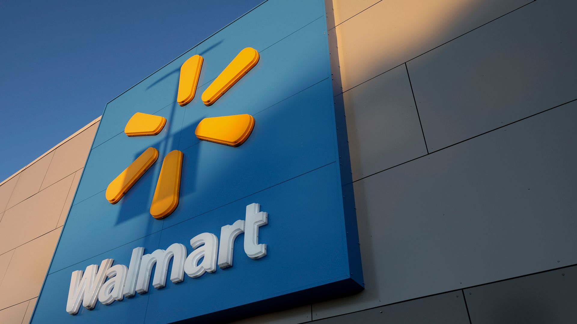 Walmart logo and name on a store building