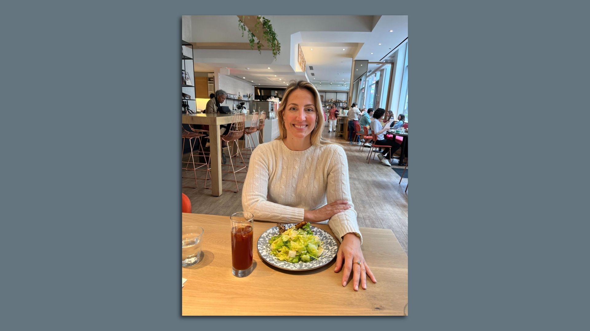 Niki Christoff pictured at Piccolina da Centrolina with a salad and iced tea