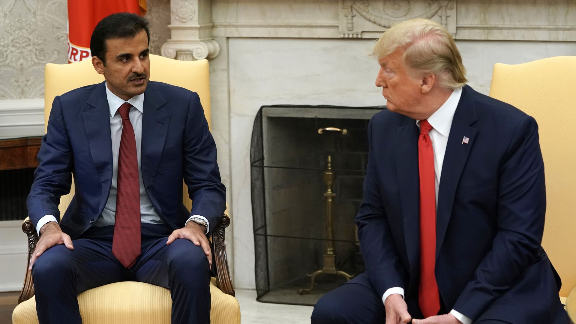 President Trump and Qatari Emir Sheikh Tamim bin Hamad Al Thani sit as they talk during an Oval Office meeting at the White House.