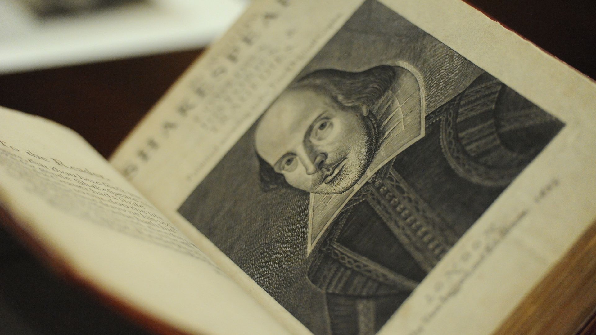 A 1632 book of Shakespeare plays with a man on the first page in Elizabethan clothing