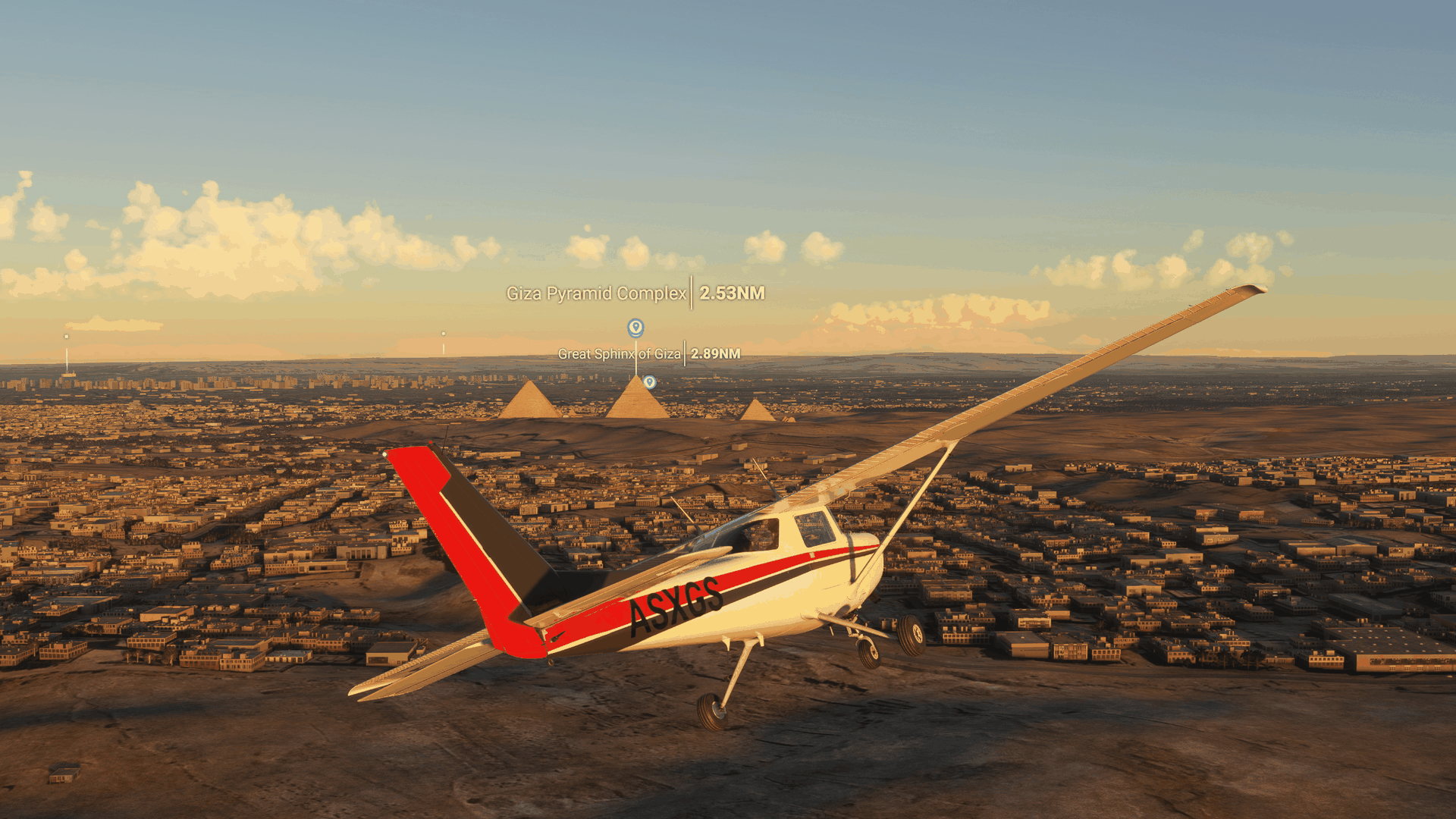 Screengrab of an animated scene showing an airplane flying over a landscape of buildings