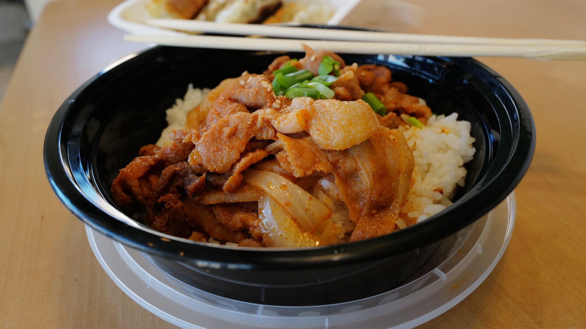 The spicy pork bulgogi bowl and pork mandu dumplings from ArkanSeoul Korean Food Company.