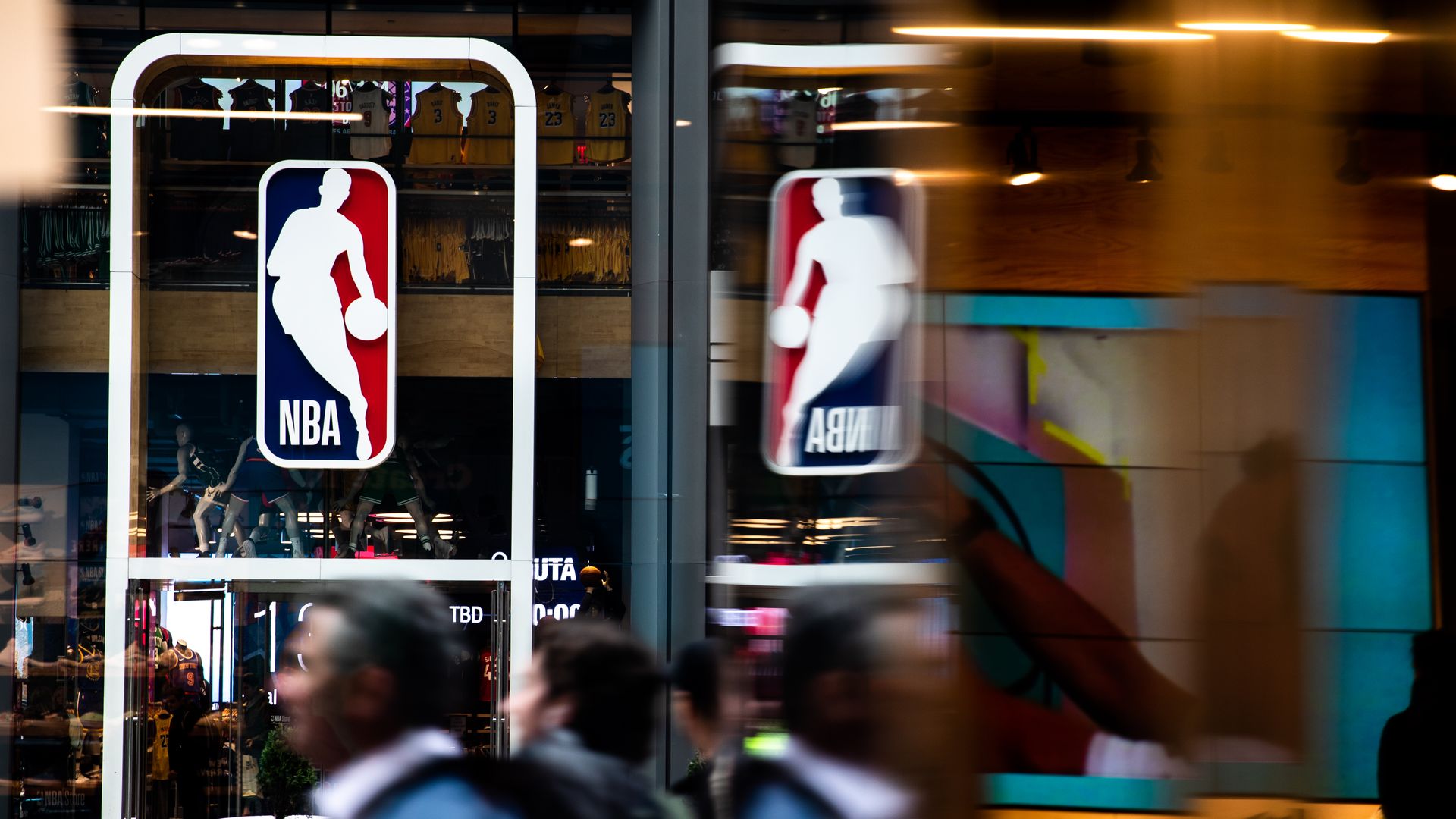The NBA logo displayed on a shop window