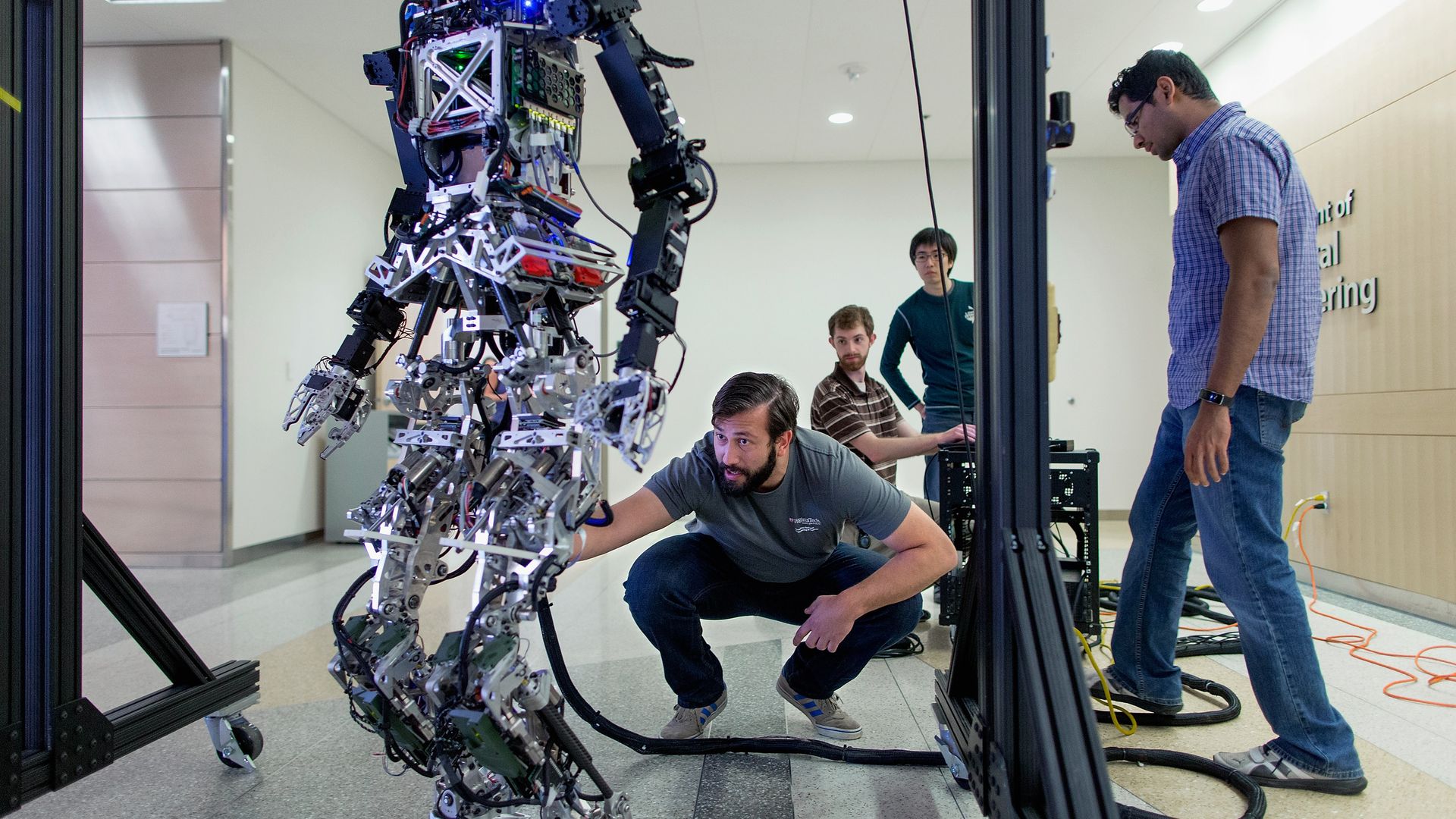 Mechanical Engineering students and Team Valor members prepare a robot for the Defense Advanced Research Projects AgencyRobotics Challenge
