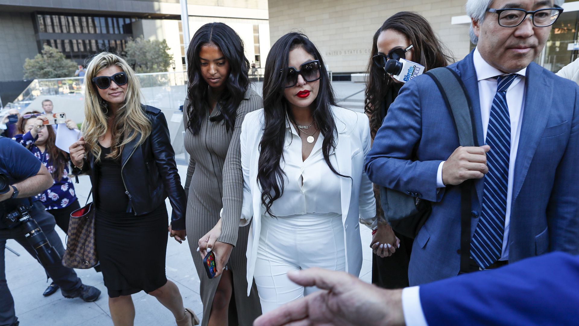 Vanessa Bryant leaves federal court after a jury ordered Los Angeles County to pay Bryant, widow of Lakers star Kobe Bryant, and another man $31 million in damages for the graphic photos