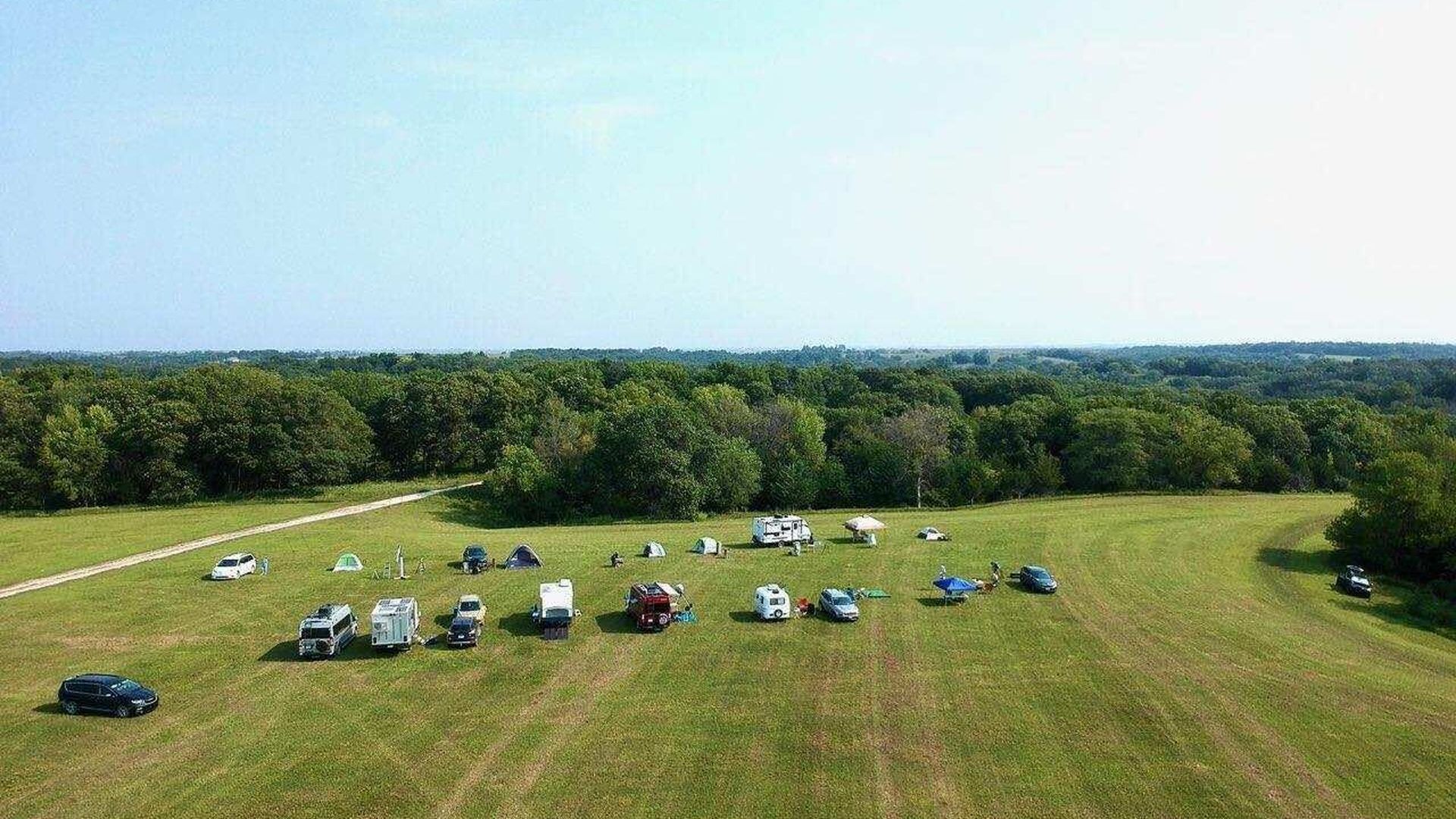 An aerial view of camper vans parked within Whiterock Conservancy.