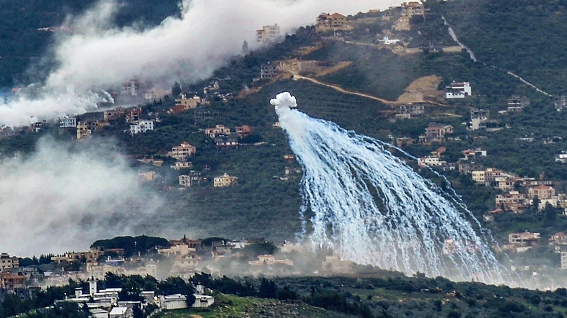 Smoke billows during Israeli shelling on the southern Lebanese village of Kfar Kila near the border with Israel on Jan. 31. Photo: Rabih Daher/AFP via Getty Images
