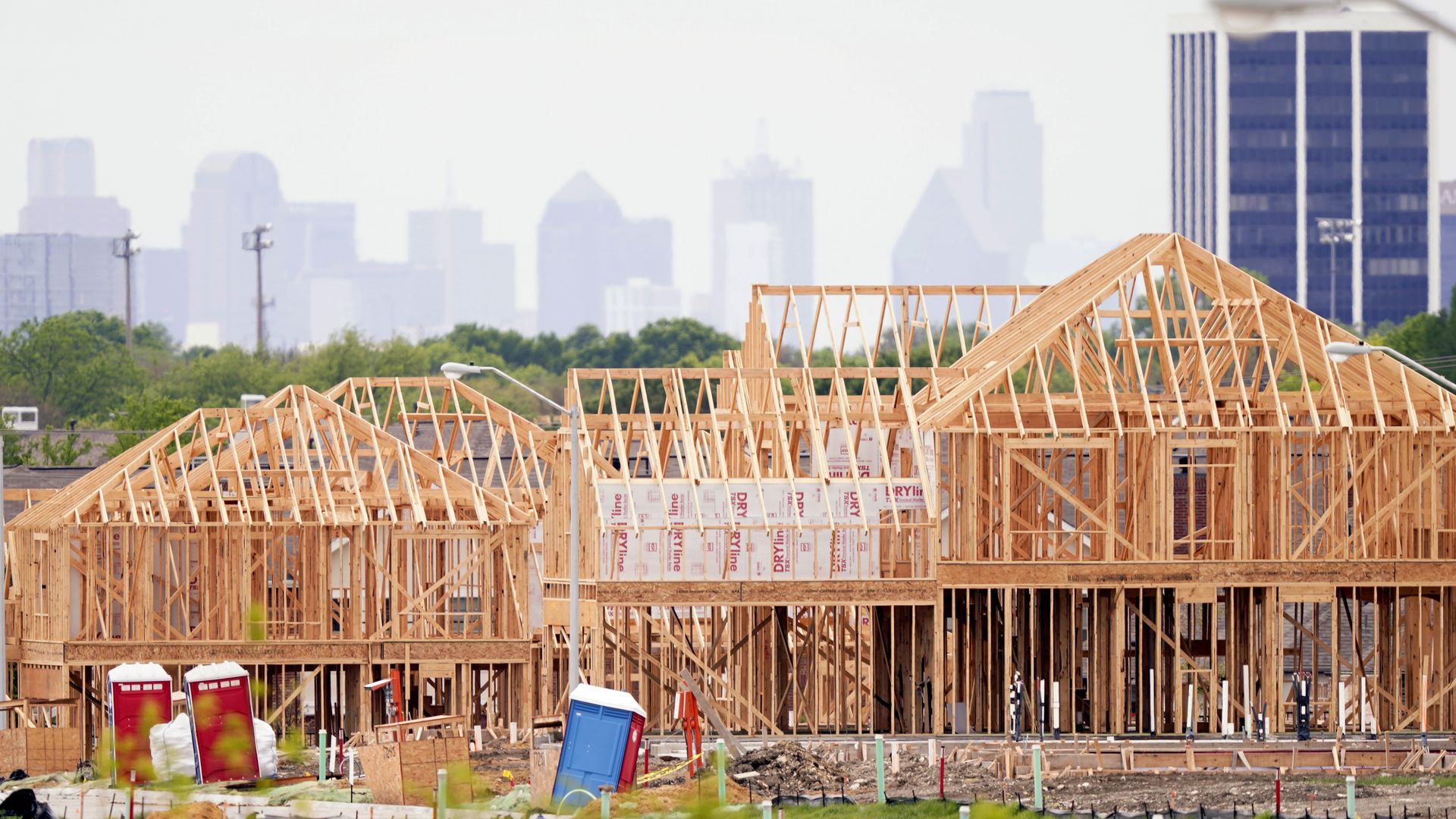 The frame of some homes being built close to downtown Dallas