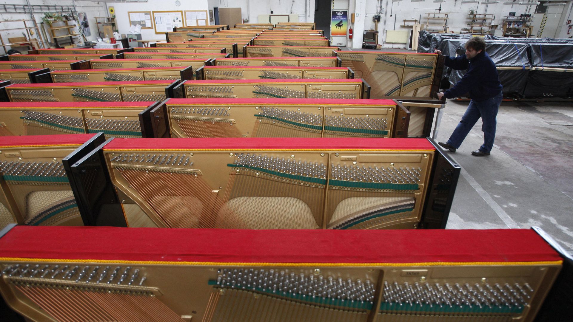 Pianos in a warehouse