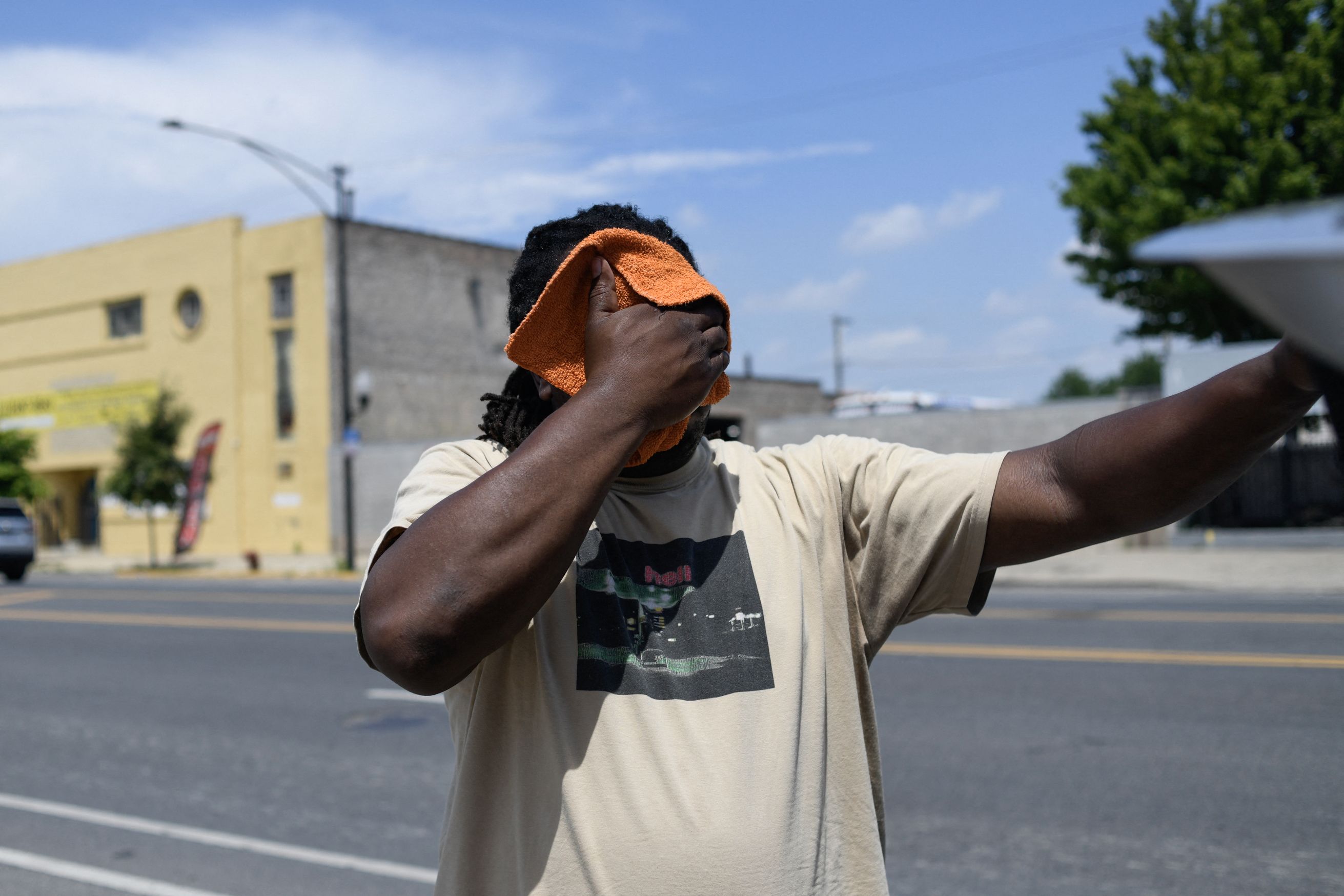 A youth football coach sweats amid a July 2026 heat wave in Chicago. Photo: Octavio Jones/AFP via Getty Images