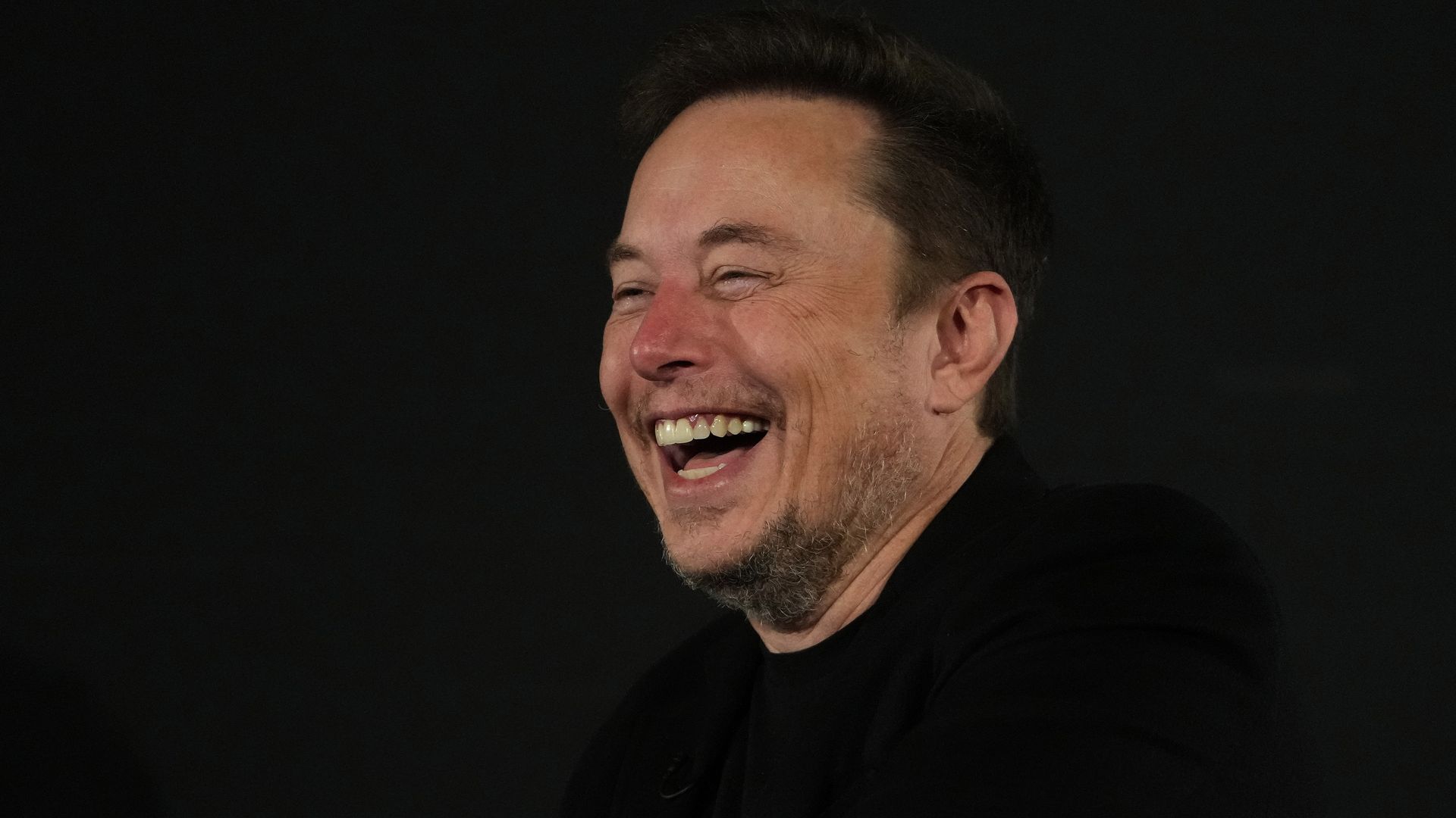 Tesla and SpaceX's CEO Elon Musk smiles during an in-conversation event with British Prime Minister Rishi Sunak at Lancaster House on November 2, 2023 in London, England.
