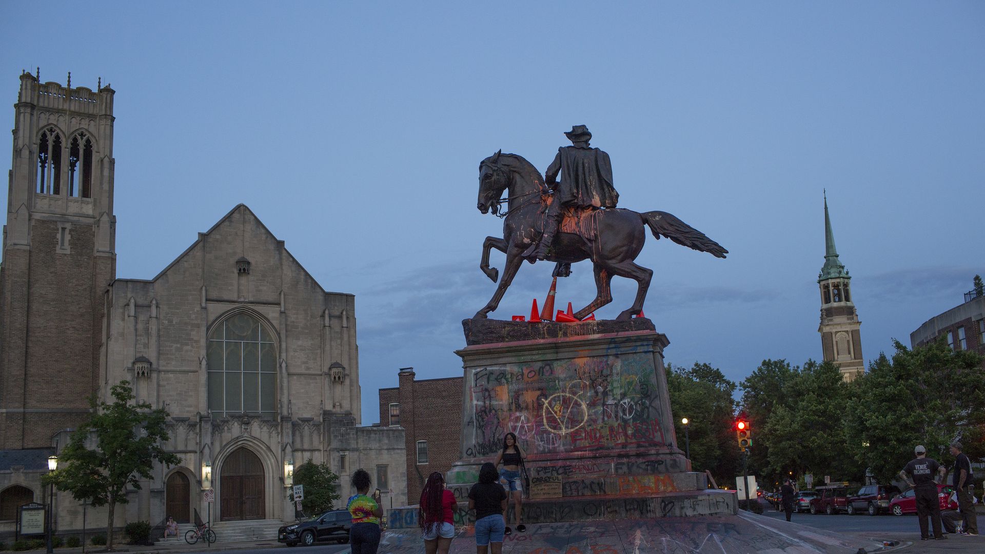 4: People visit the graffiti-covered statue of Confederate General JEB Stuart on June 14, 2020 at Monument Avenue in Richmond, Virginia. 