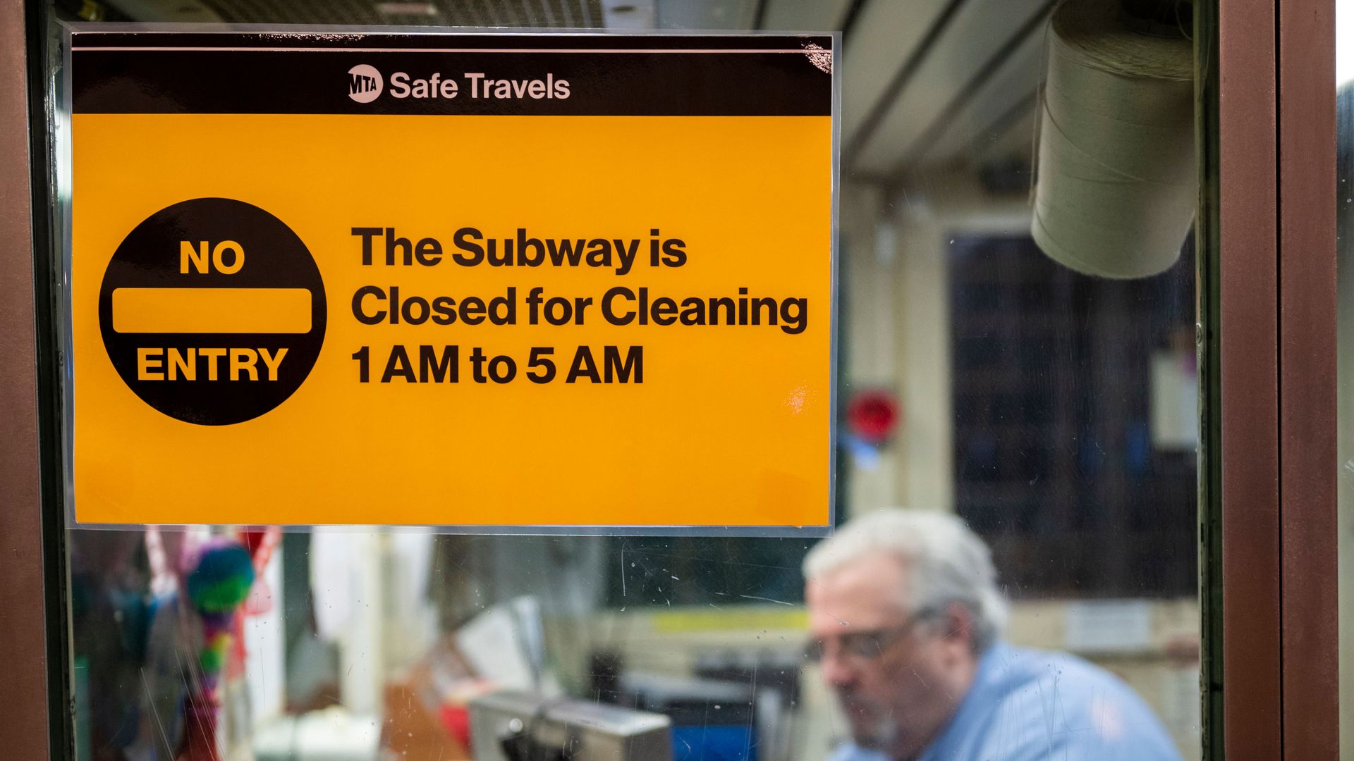 A sign stating the New York City subway closure is displayed on a Mass Transit Authority (MTA) ticket booth
