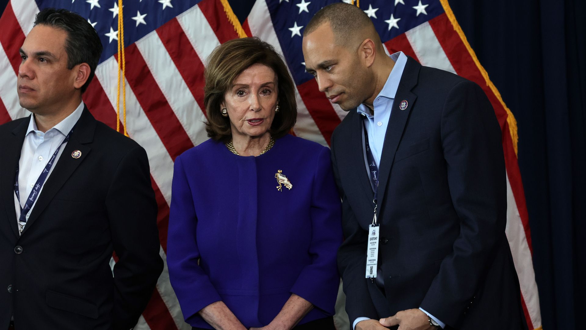 U.S. Speaker of the House Rep. Nancy Pelosi (D-CA) (C), Rep. Pete Aguilar (D-CA) (L) and Democratic Caucus Chairman Hakeem Jeffries (D-NY) (R) listen during a news conference s)