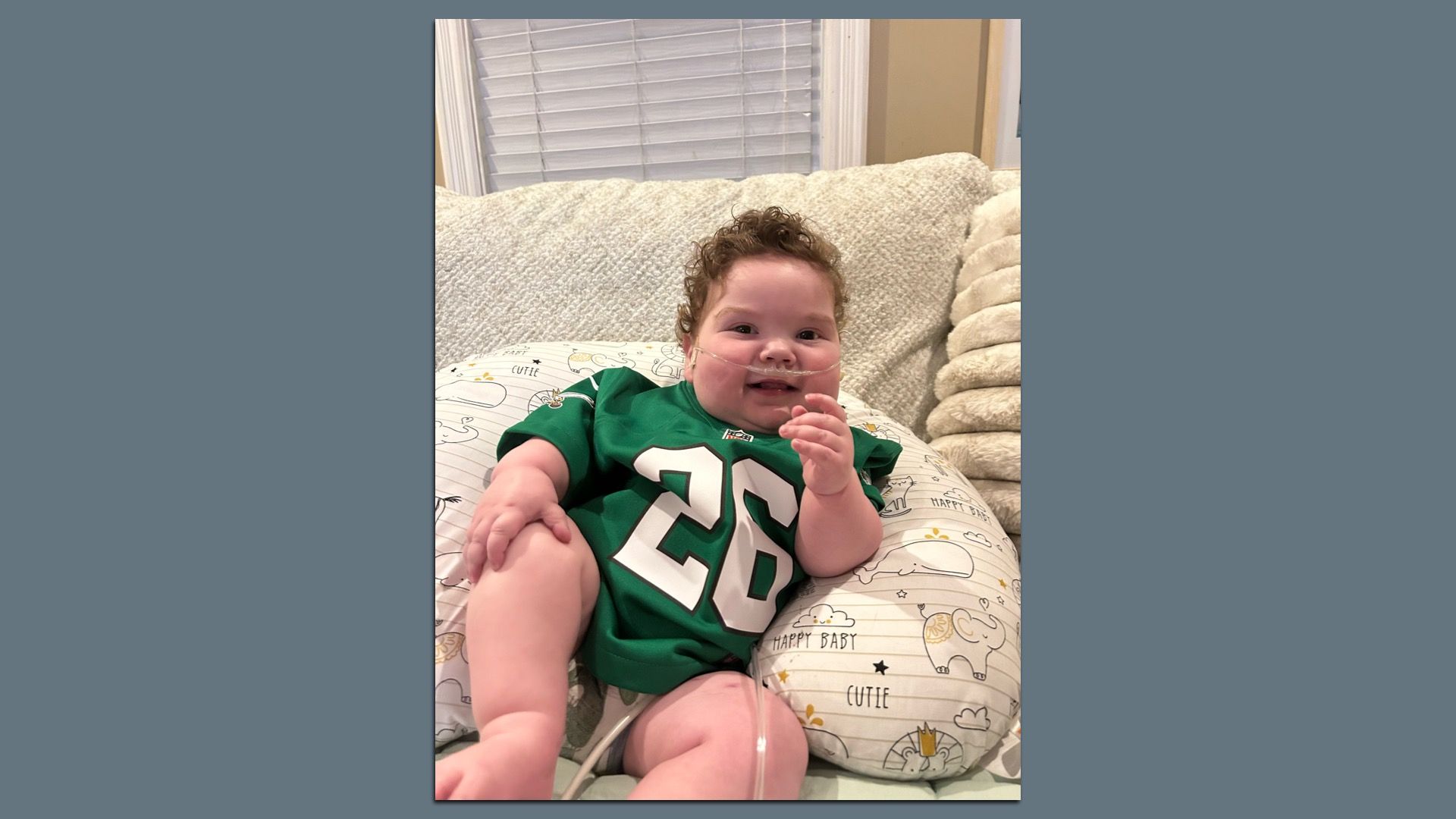 Callan Palladino wearing his Kelly green Saquon Barkley jersey.