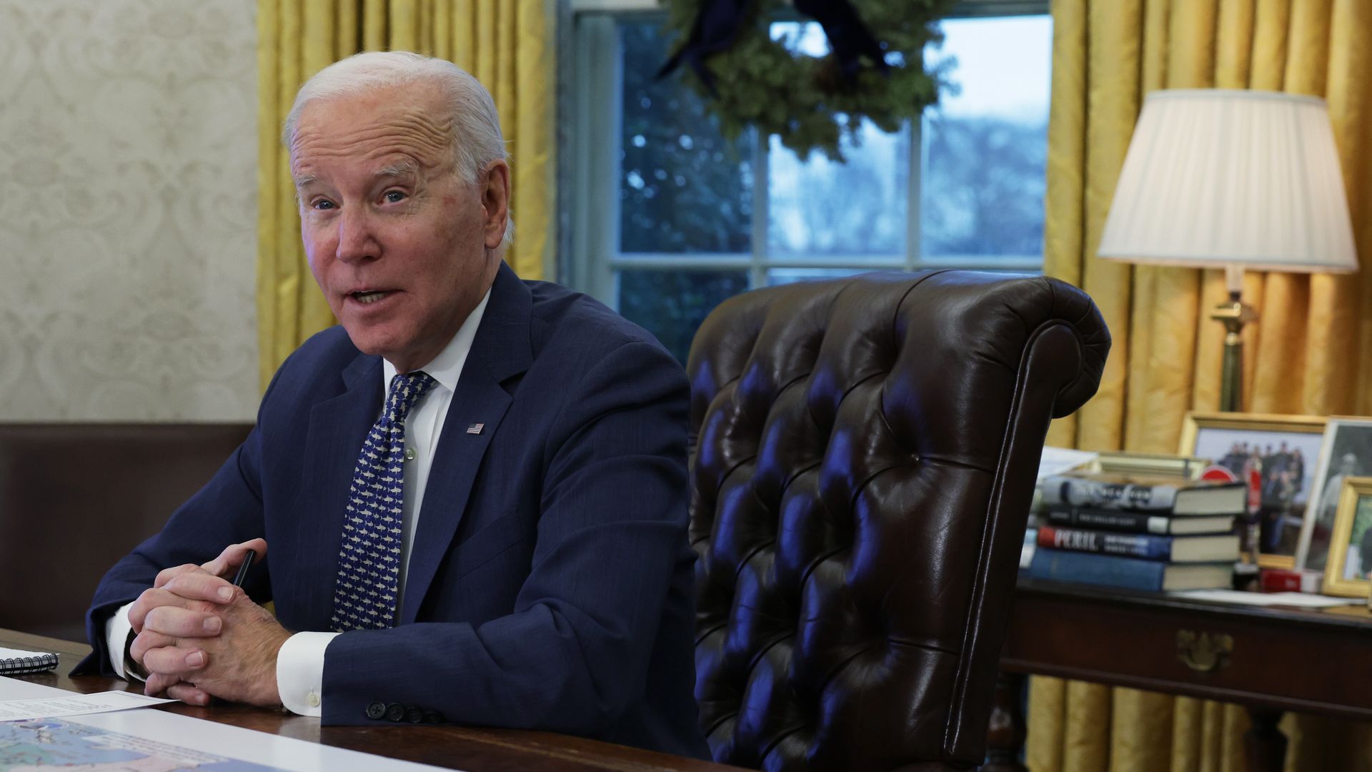 President Biden speaks to members of the press in the Oval Office on Thursday.