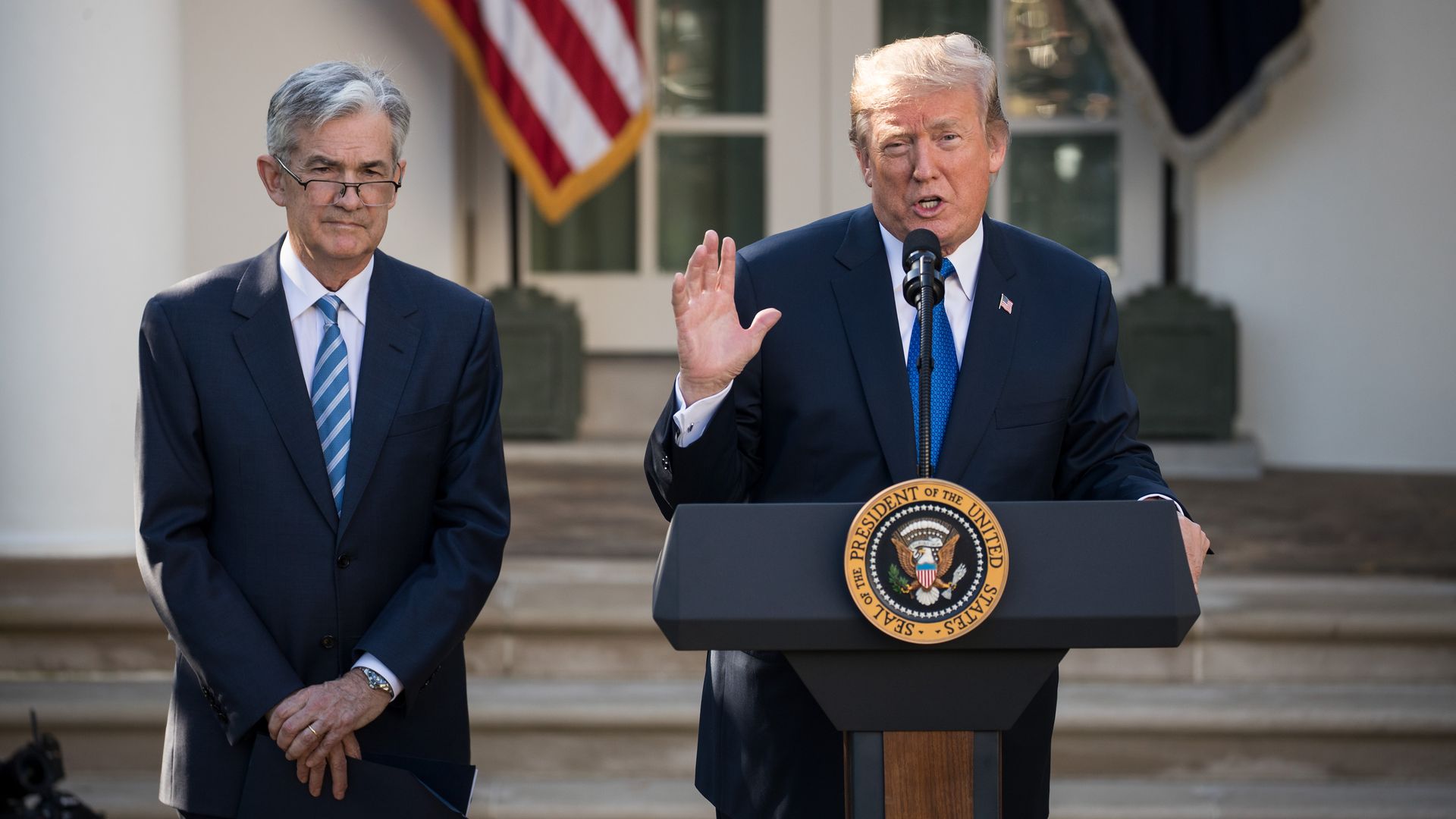 President Trump stands with Federal Reserve chairman Jerome Powell in front of the White House