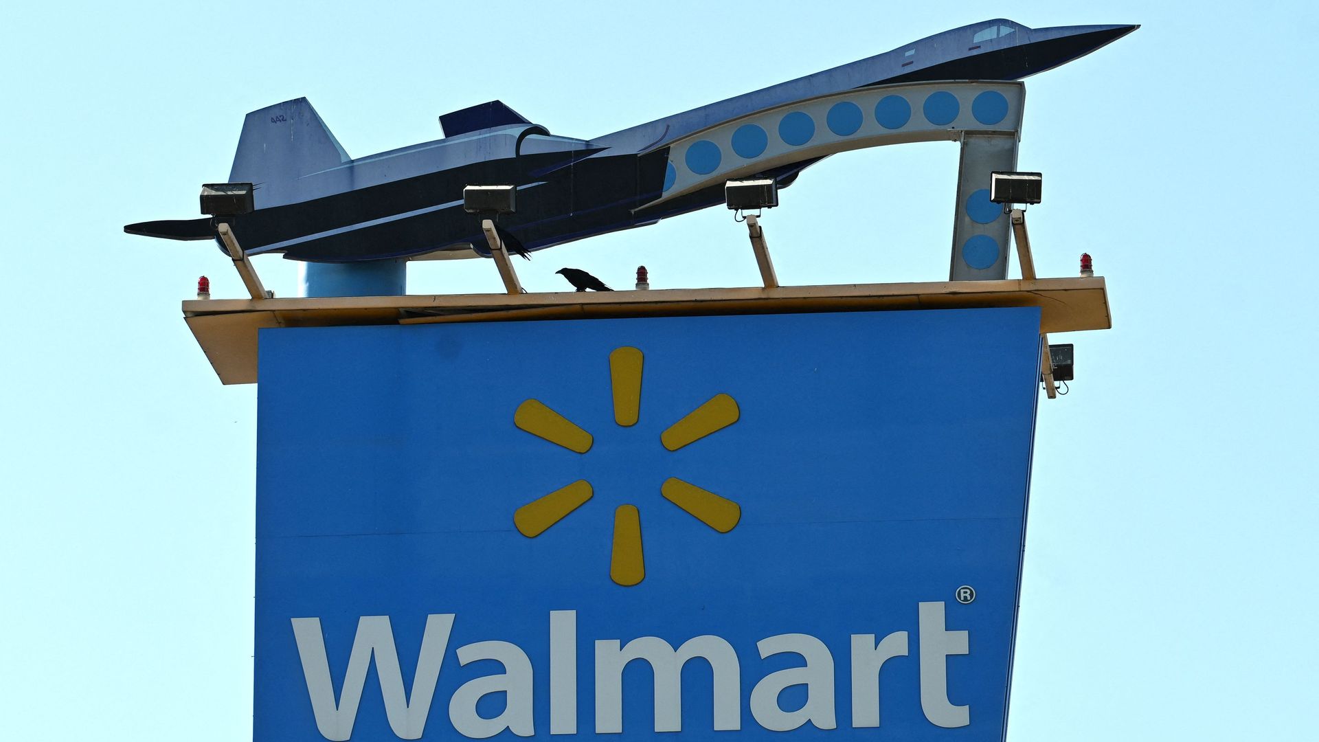 Walmart banner under a large plane