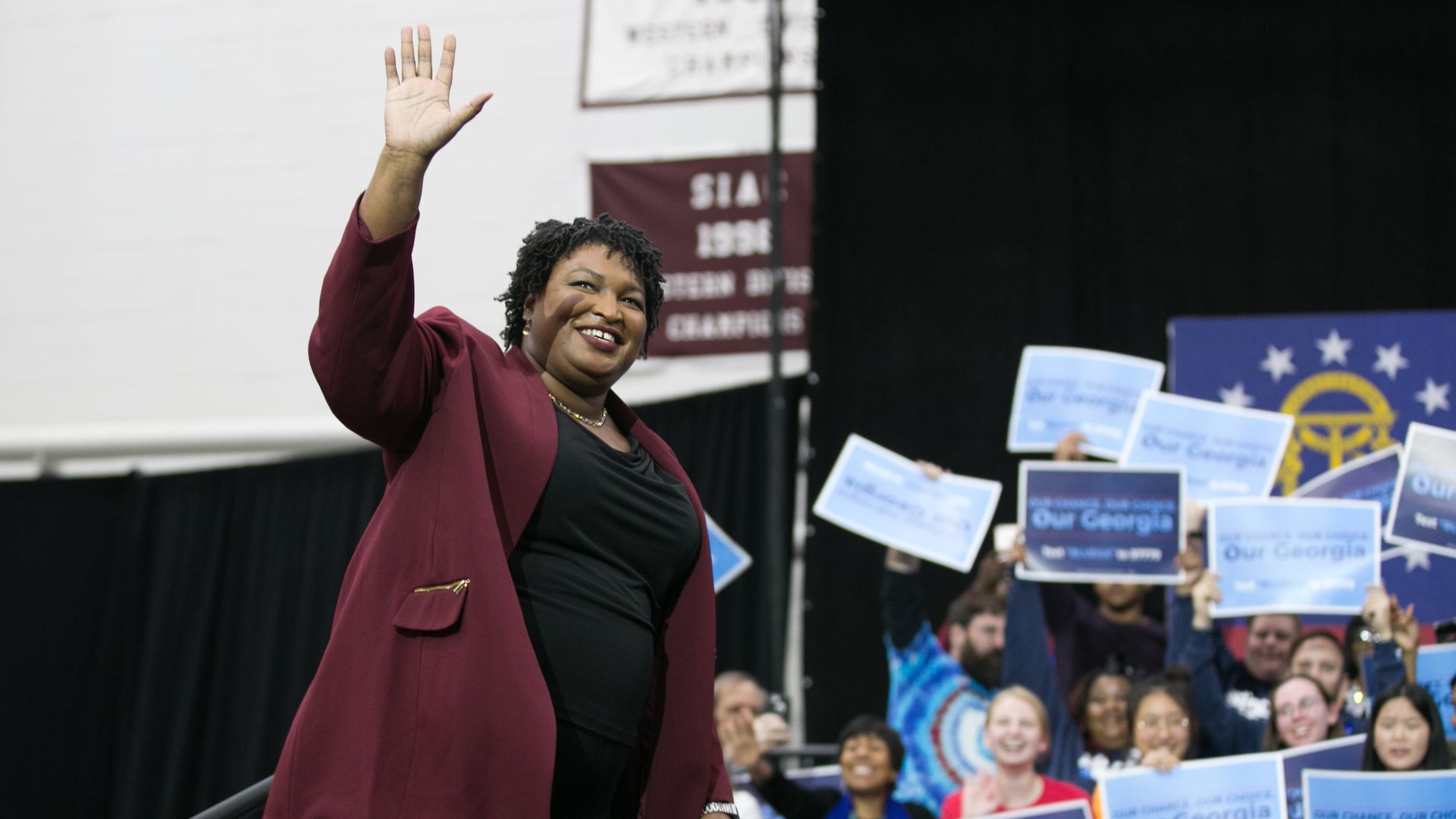Stacey Abrams waving