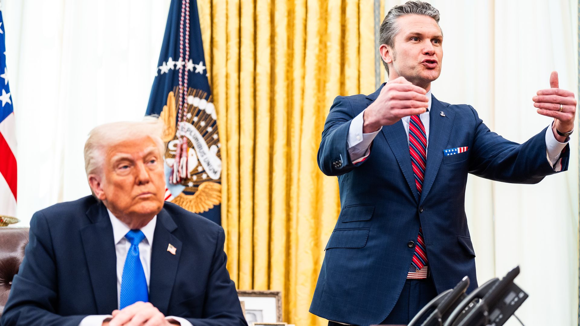 US Secretary of Defense Pete Hegseth speaks with US President Donald Trump during a meeting in announcing the F-47 6th generation fighter jet in the Oval Office of the White House on Friday March 21, 2025.