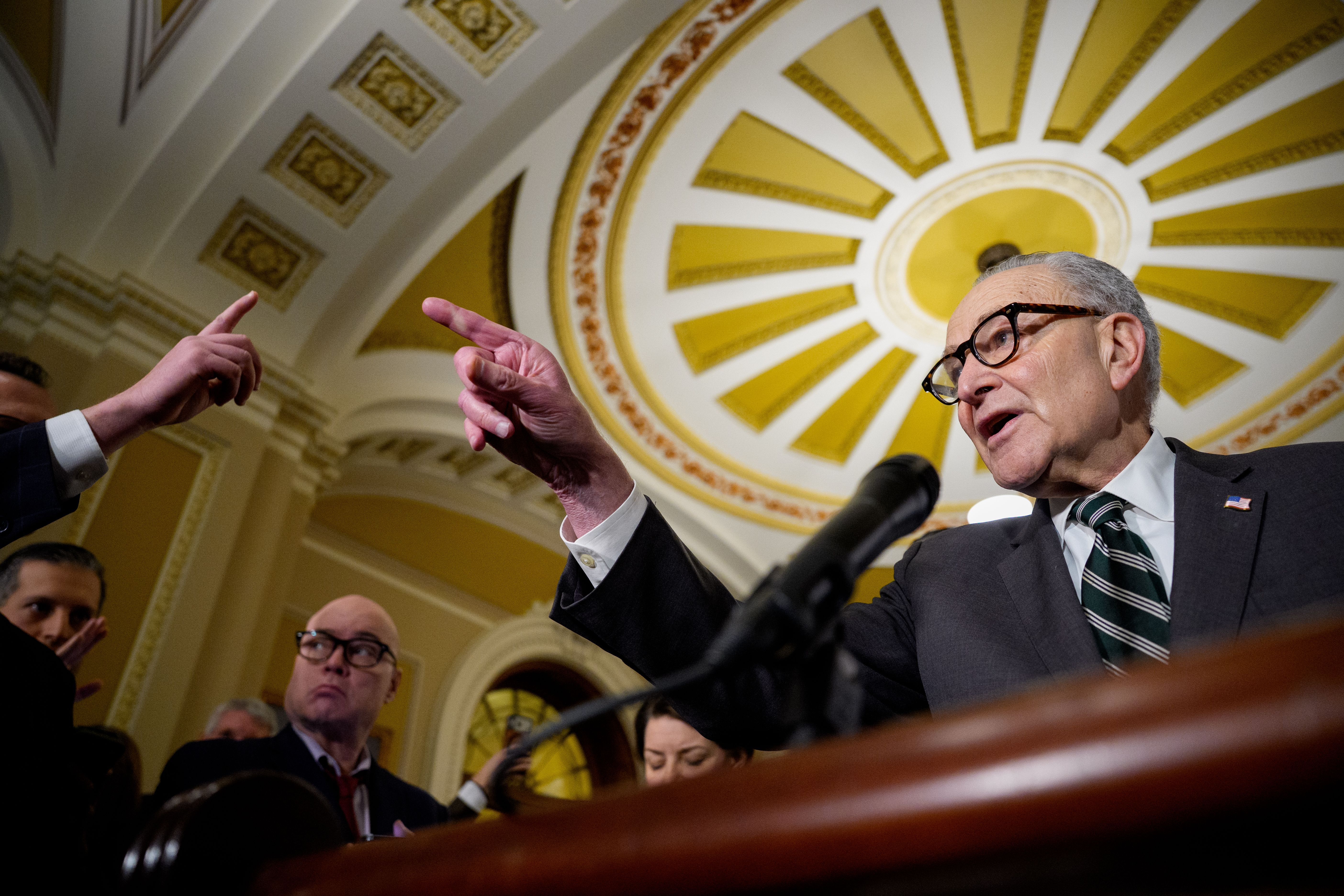 WASHINGTON, DC - MARCH 17: Senate Minority Leader Chuck Schumer (D-NY) takes a question from a reporter following a Democratic policy luncheon at the U.S. Capitol Building on March 17, 2026 in Washington, DC. Schumer discussed the negotiation progress on funding for the U.S. Department of Homeland S