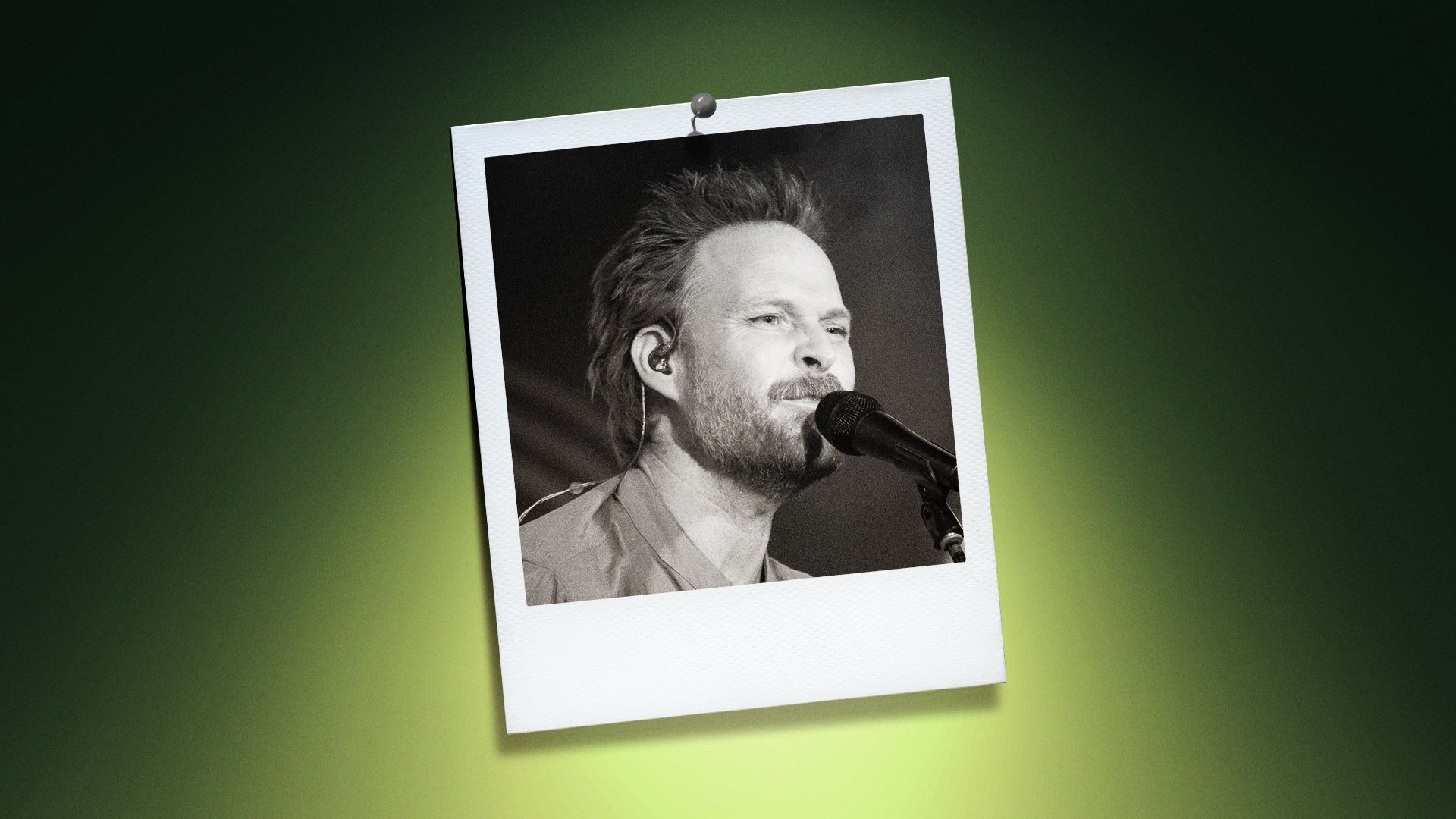 Photo illustration of MC Taylor in a polaroid frame.