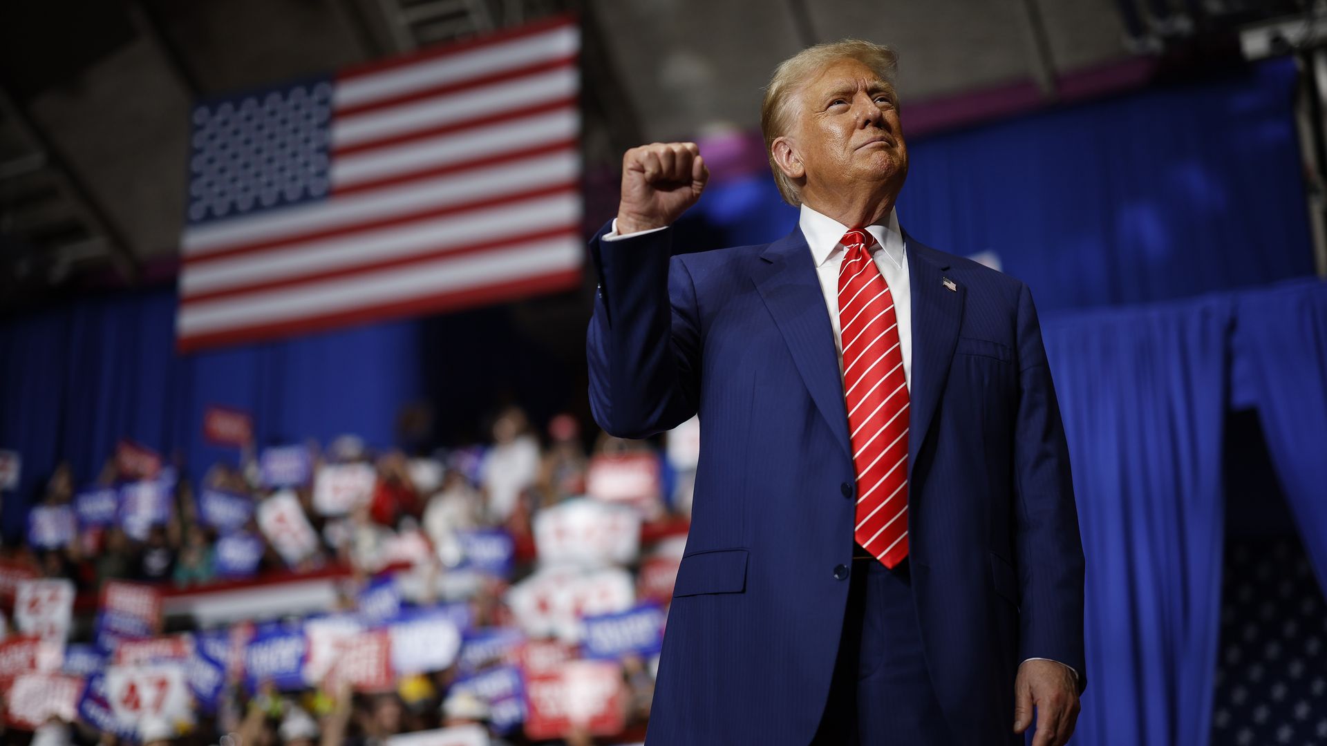 former U.S. President Donald Trump takes the stage during a campaign rally in the 1st Summit Arena at the Cambria County War Memorial on August 30, 2024 in Johnstown, Pennsylvania. Promising to cut energy bills in half, conduct the largest deportation operation in history and put a 200% tariff on fo