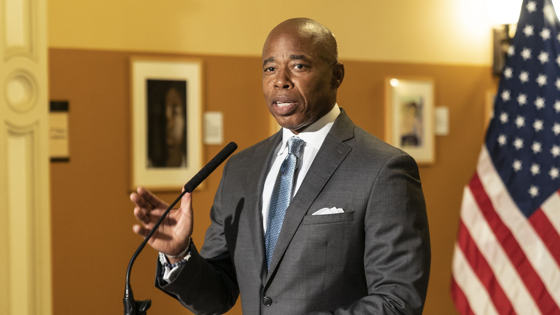 Photo of Eric Adams speaking from a podium