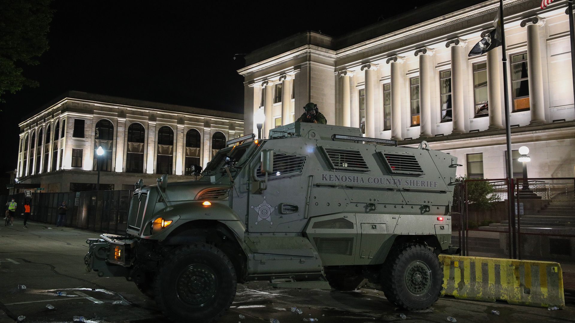  Police take security measurements during a third night of unrest