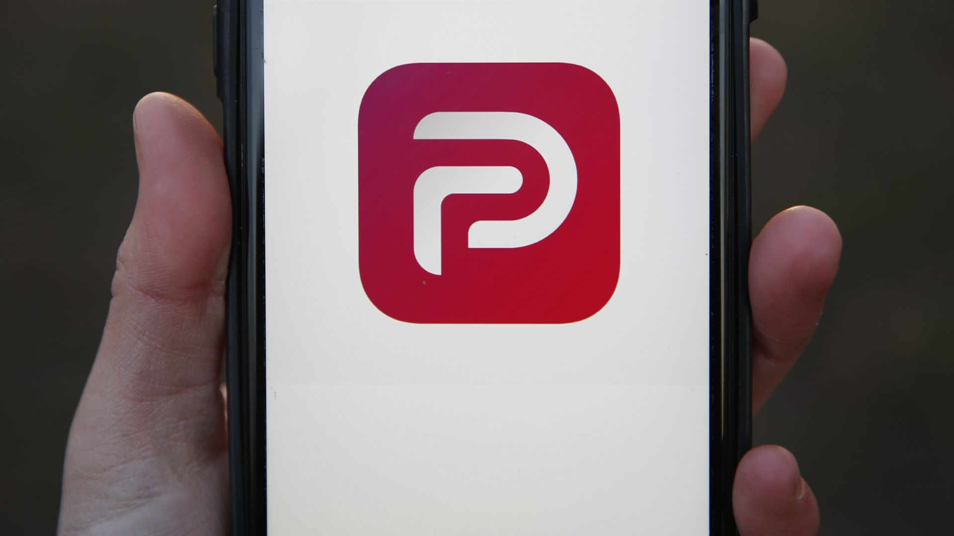A general view of the the Parler app icon displayed on an iPhone on January 9, 2021 in London, England. 