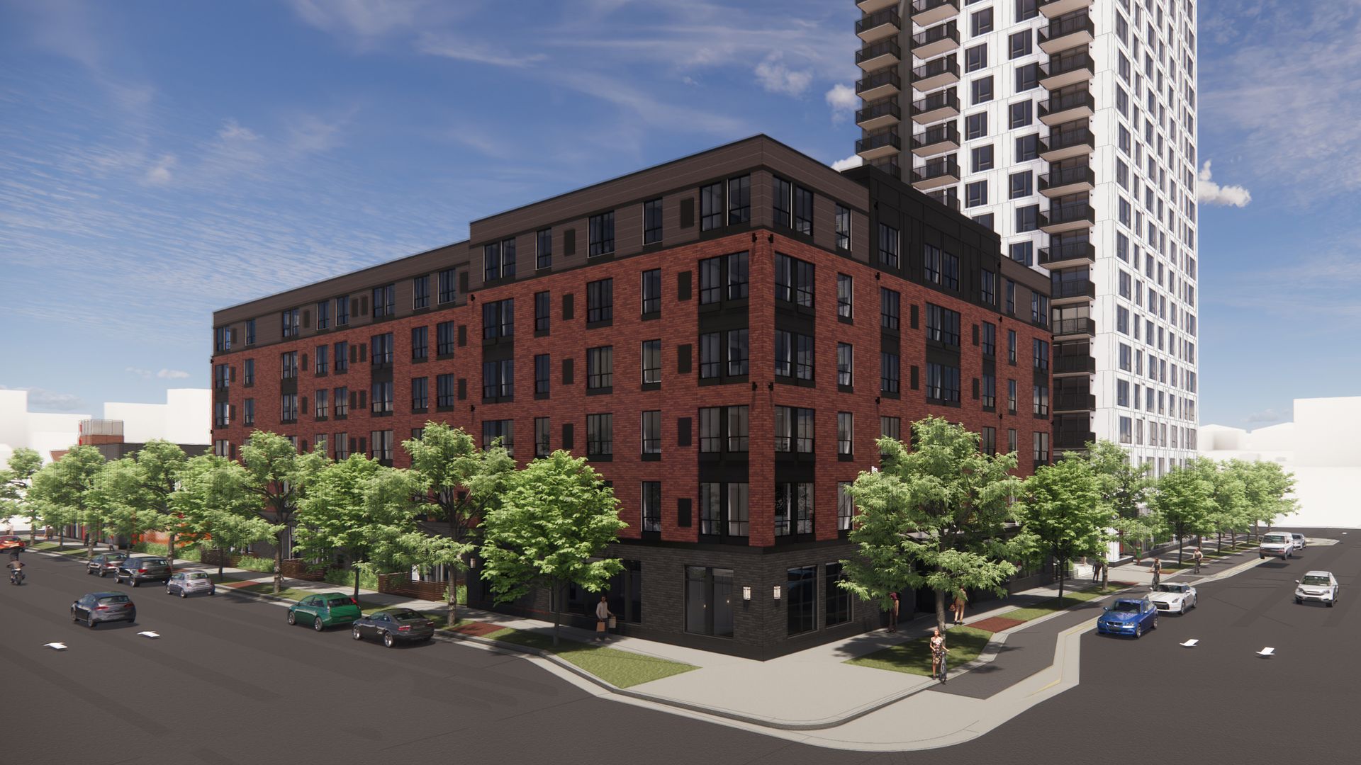 A brick building in front of a tower