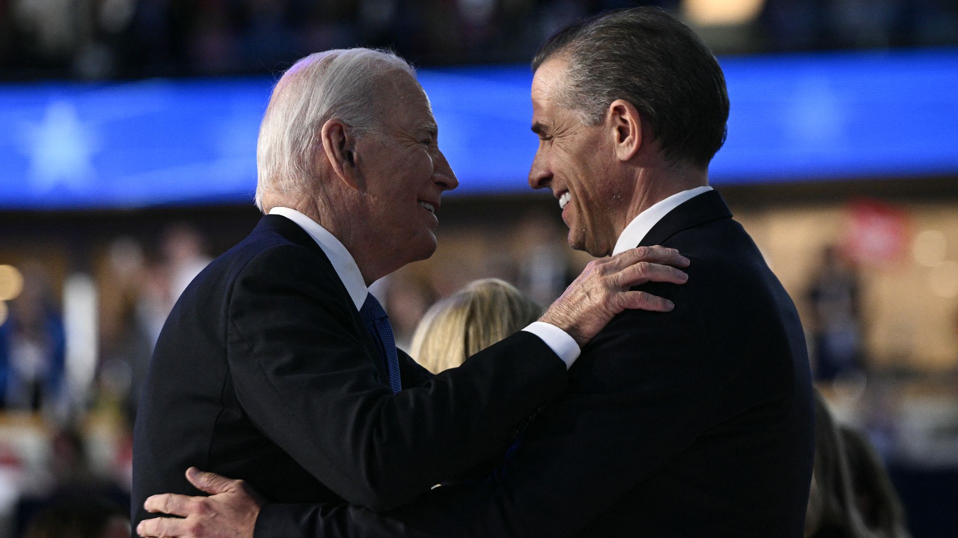  President Joe Biden and his son Hunter Biden hug on stage at the conclusion of the first day of the Democratic National Convention (DNC) at the United Center in Chicago, Illinois, on August 19, 2024. 