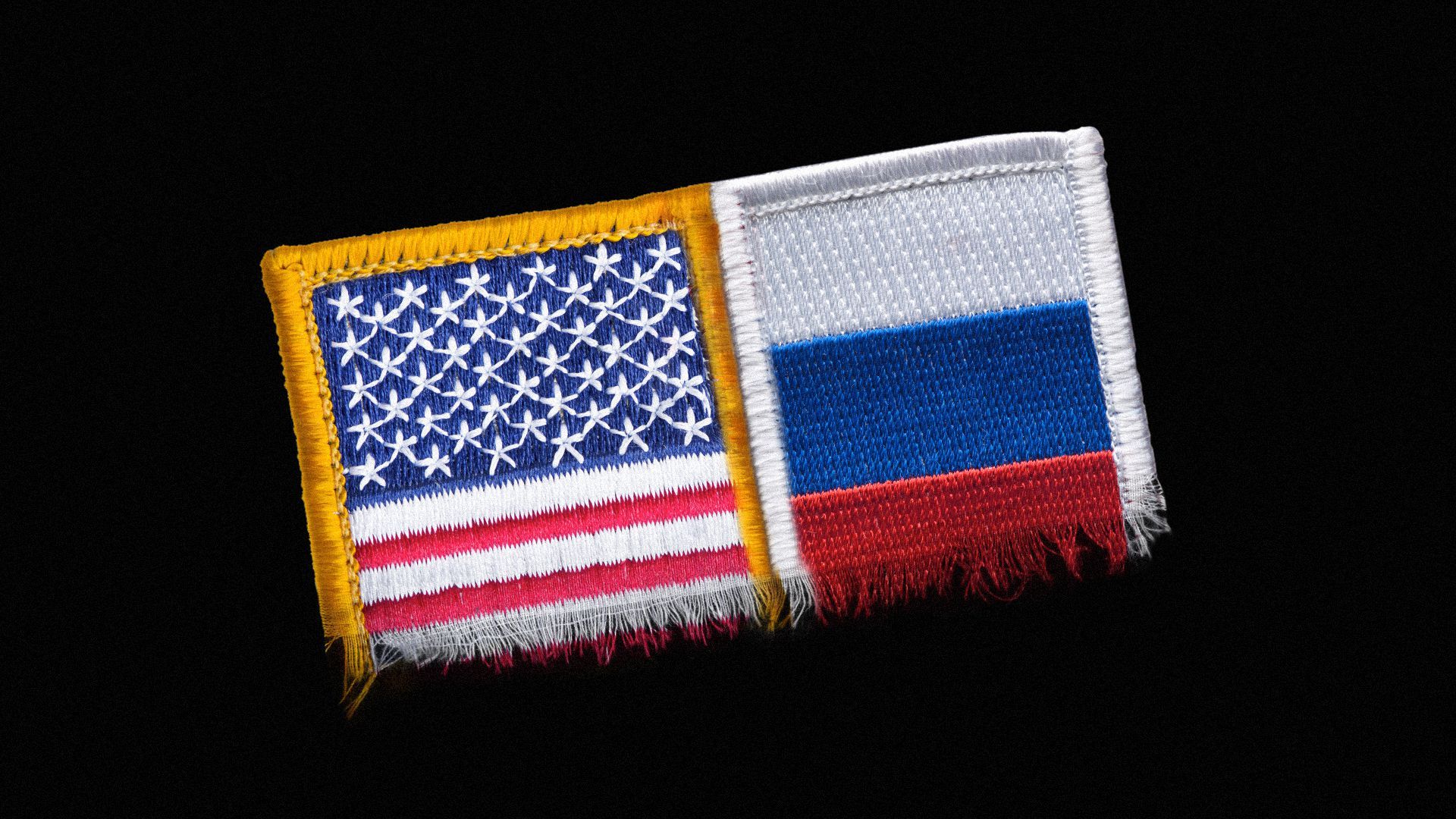 Illustration of a flag patch made up of the American and Russian flags unravelling. 