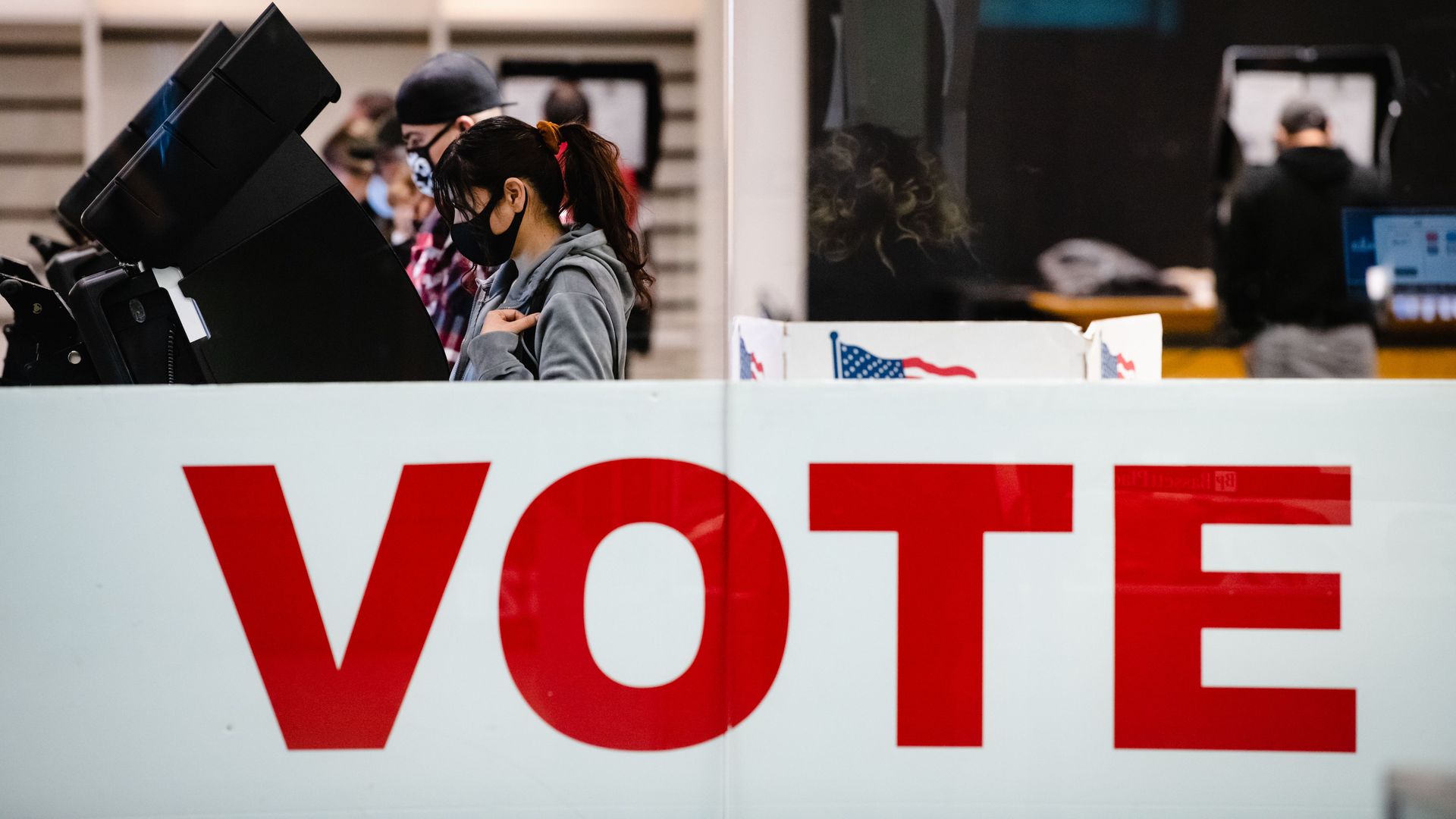  A woman casts her ballot in the 2020 general election inside the Basset Place Mall in El Paso, Texas on November 3, 2020