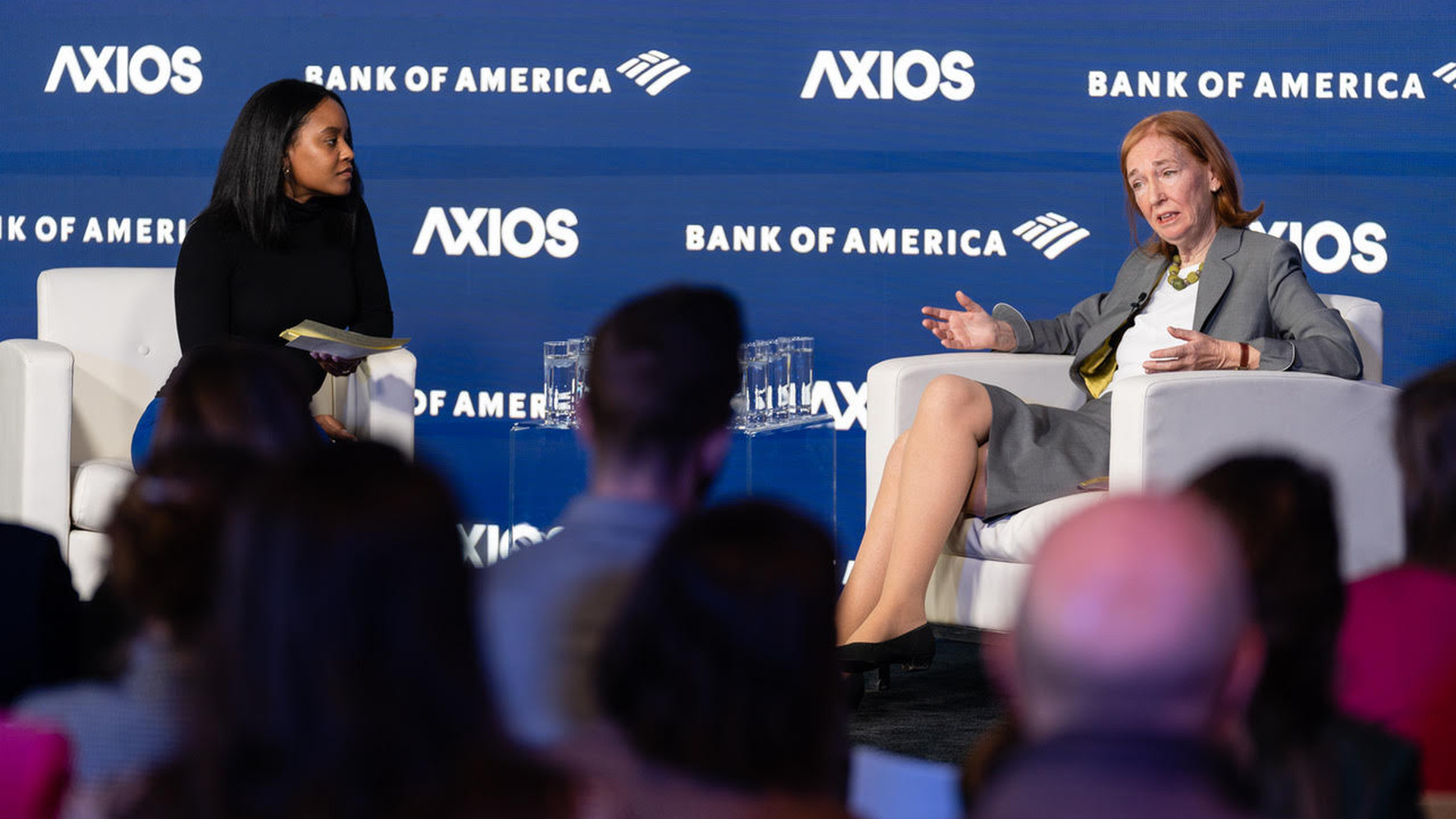 two women on stage mid discussion