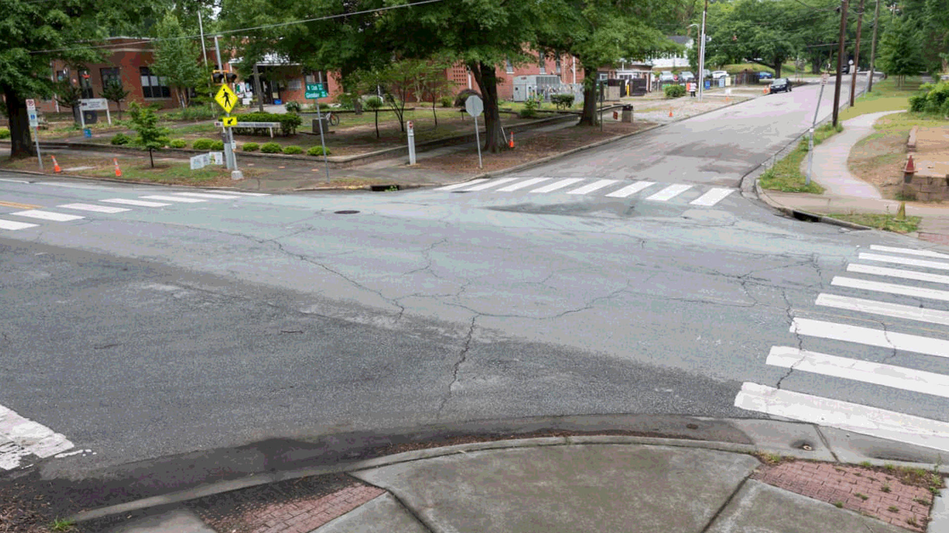 Animated GIF photo of before and after colorful paint was applied to the crosswalks and pavement at an intersection in Durham, N.C.