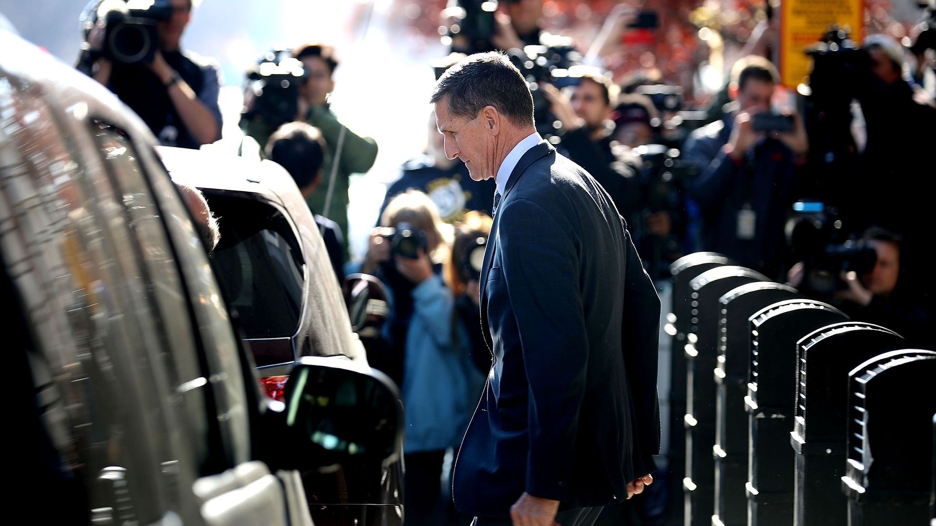 Michael Flynn leaves following his plea hearing in December.