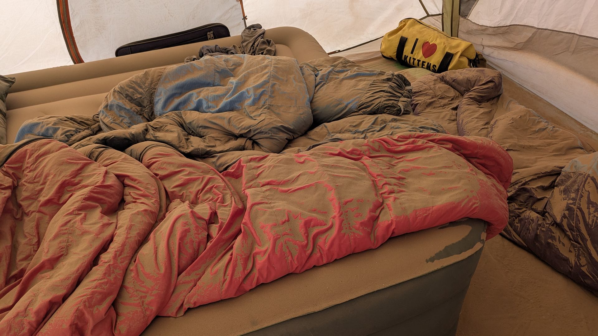 Brown dust covers camping gear