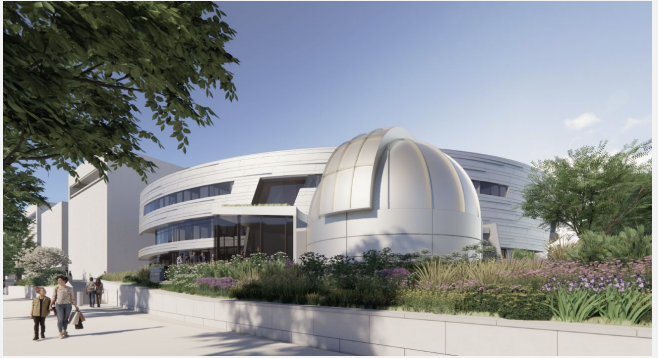A render of a space-agey Bezos Learning Center, circular and in silver tones, with landscaping out front. 